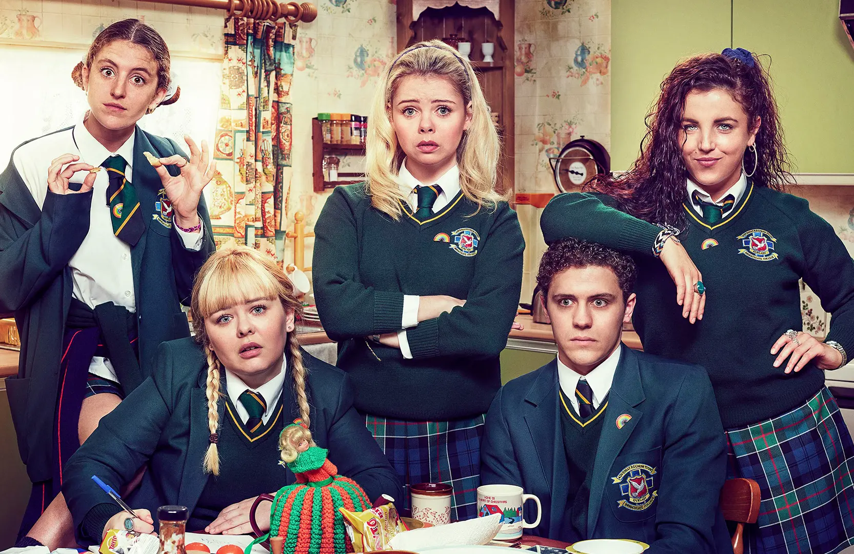 Left to right, Orla (Louisa Harland), Clare (Nicola Coughlan), Erin (Saoirse-Monica Jackson), James (Dylan Llewellyn), and Michelle (Jamie-Lee O'Donnell) in Derry Girls (Channel 4/Netflix)