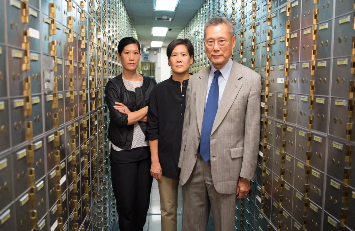 Vera Sung, Jill Sung, and Thomas Sung of Abacus Federal Savings Bank, in a promotional image for &lt;i&gt;Abacus: Small Enough to Jail&lt;/i&gt;. (PBS)