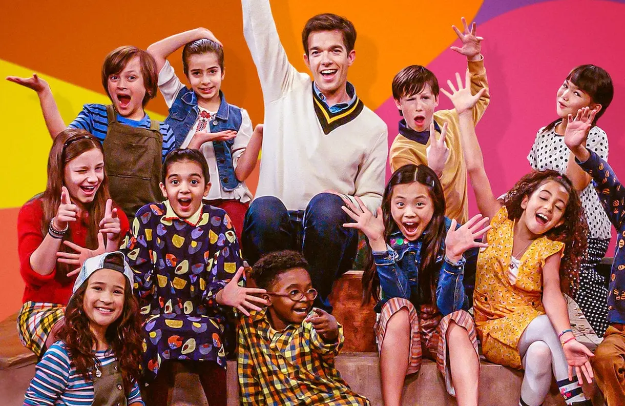 John Mulaney with the cast of his most unusual comedy special. (Netflix)