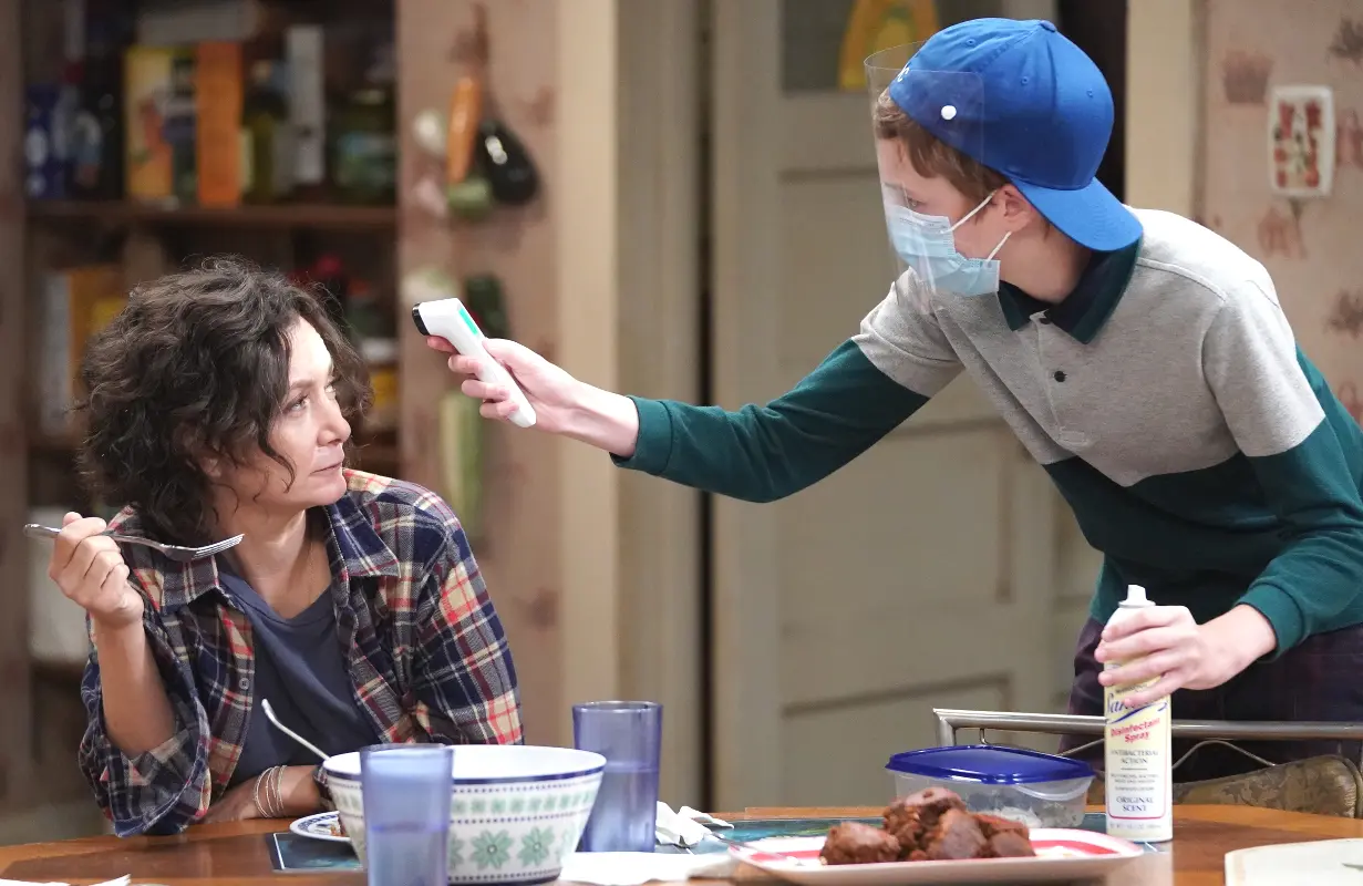 Sara Gilbert and Ames McNamara in a scene from "Keep on Truckin' Six Feet Apart," the Season 3 premiere of The Conners. (Photo: Eric McCandless/ABC)