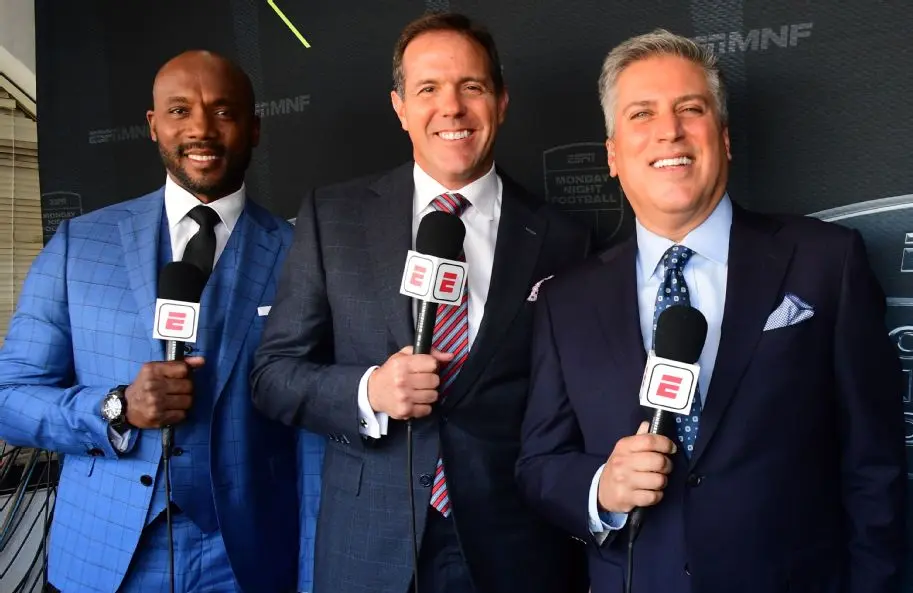 The current Monday Night Football broadcast booth — Louis Riddick, Brian Griese and Steve Levy — will likely be shaken up, again. (Photo: ESPN)