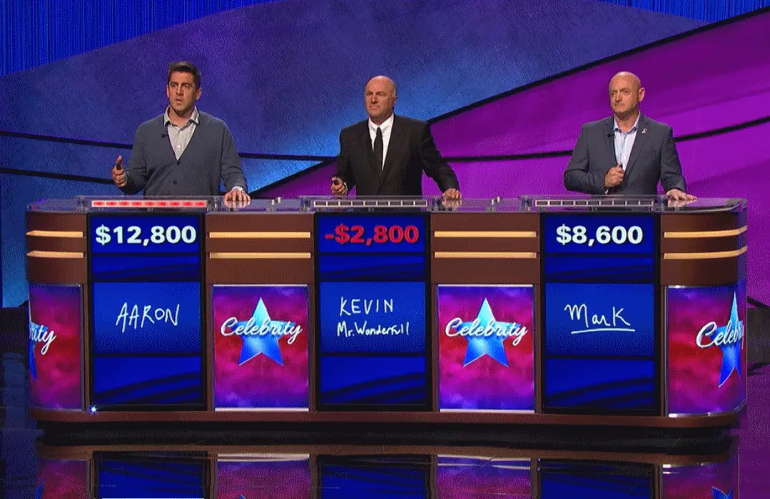 O'Leary (center) had the misfortune of competing against  two particularly brainy celebs in Aaron Rodgers (left) and Mark Kelly (right), but he can't blame them for his negative score.