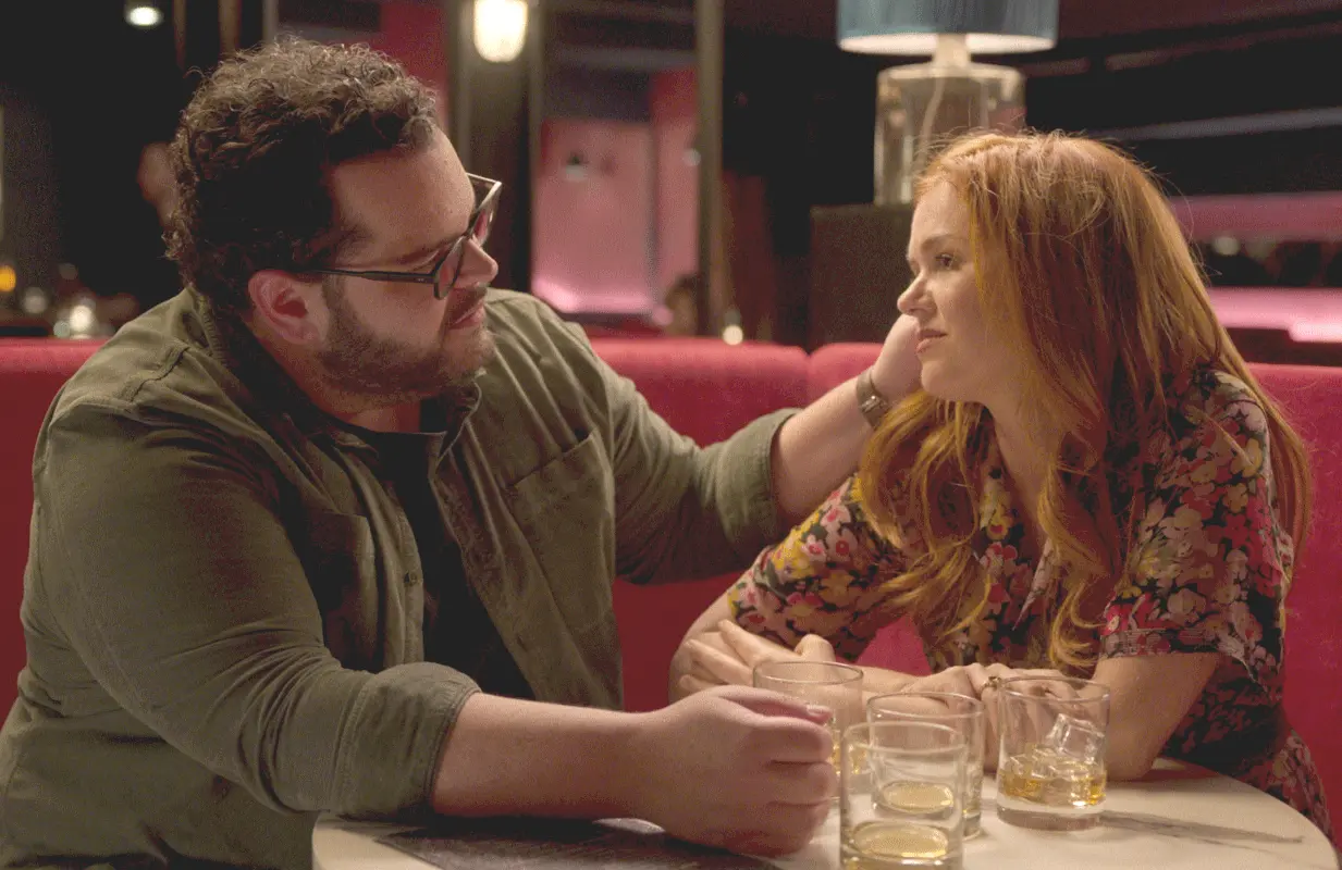 Isla Fisher and Josh Gad play American expats thrown together by the universe in Peacock's new series. (Photo: Peacock)