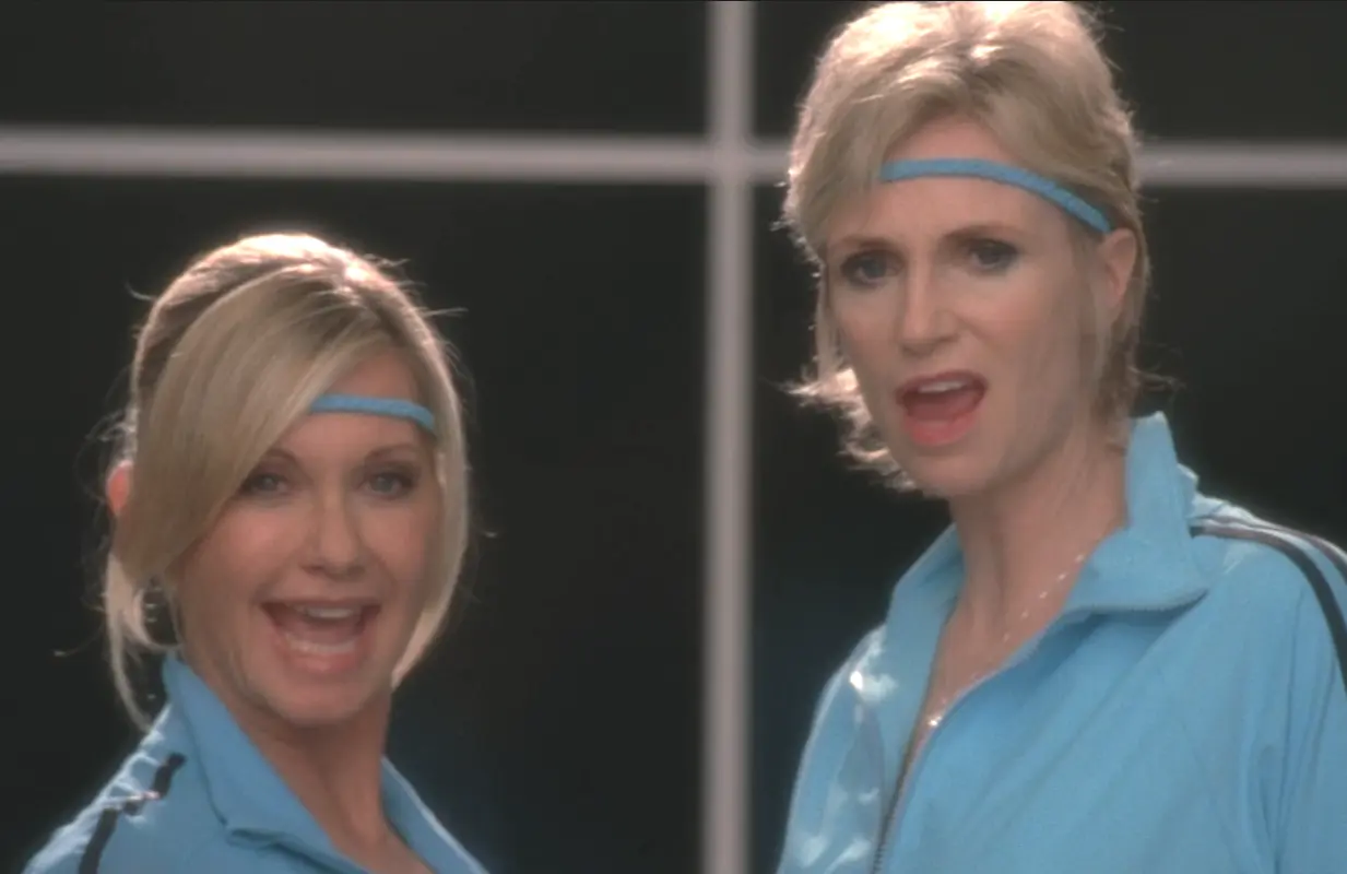 Olivia Newton-John and  Jane Lynch in Glee. Photo: Fox/Disney+