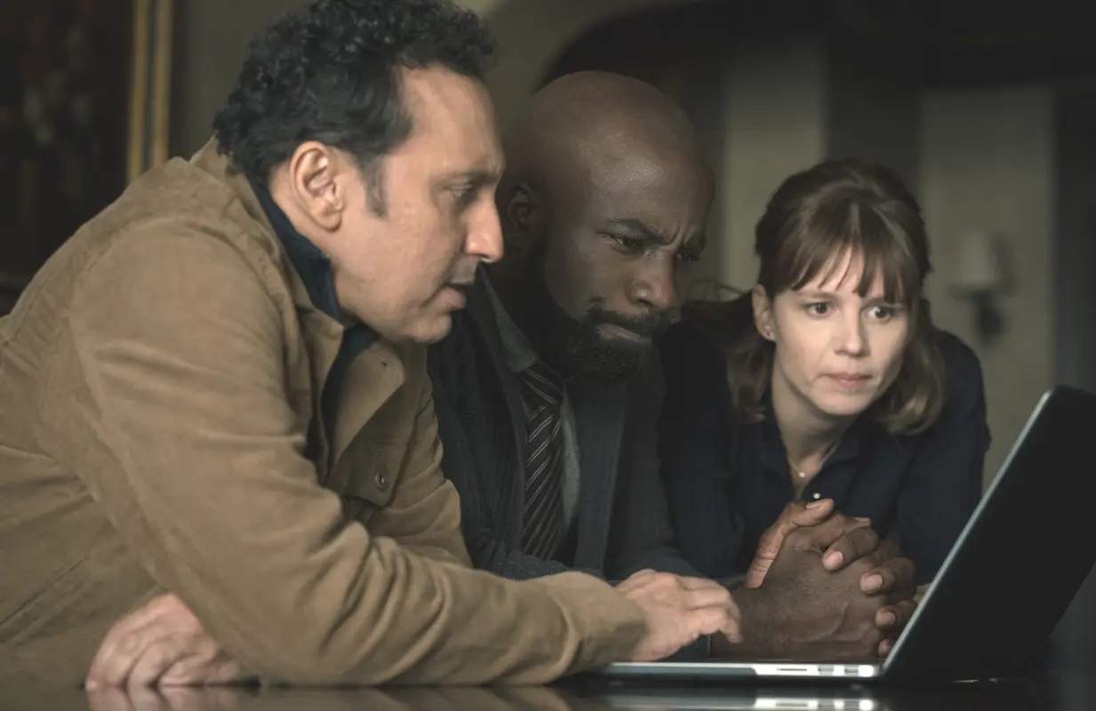 Ben (Aasif Mandvi), David (Mike Colter), and Kristen (Katja Herbers) investigate the demon of algorithms in Evil Season 3. (Photo: Elizabeth Fisher/Paramount+)