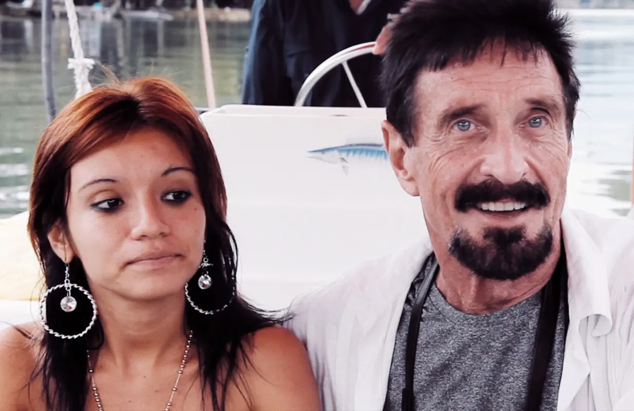 John McAfee with his former girlfriend Samantha Herrera in an image from Running With the Devil: The Wild World of John McAfee. (Photo: Netflix)
