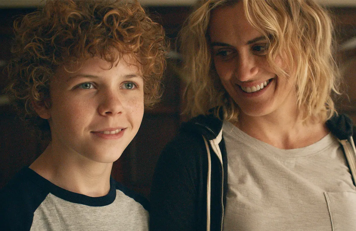 Colin O'Brien and Taylor Schilling in Dear Edward (Photo: Apple TV+)