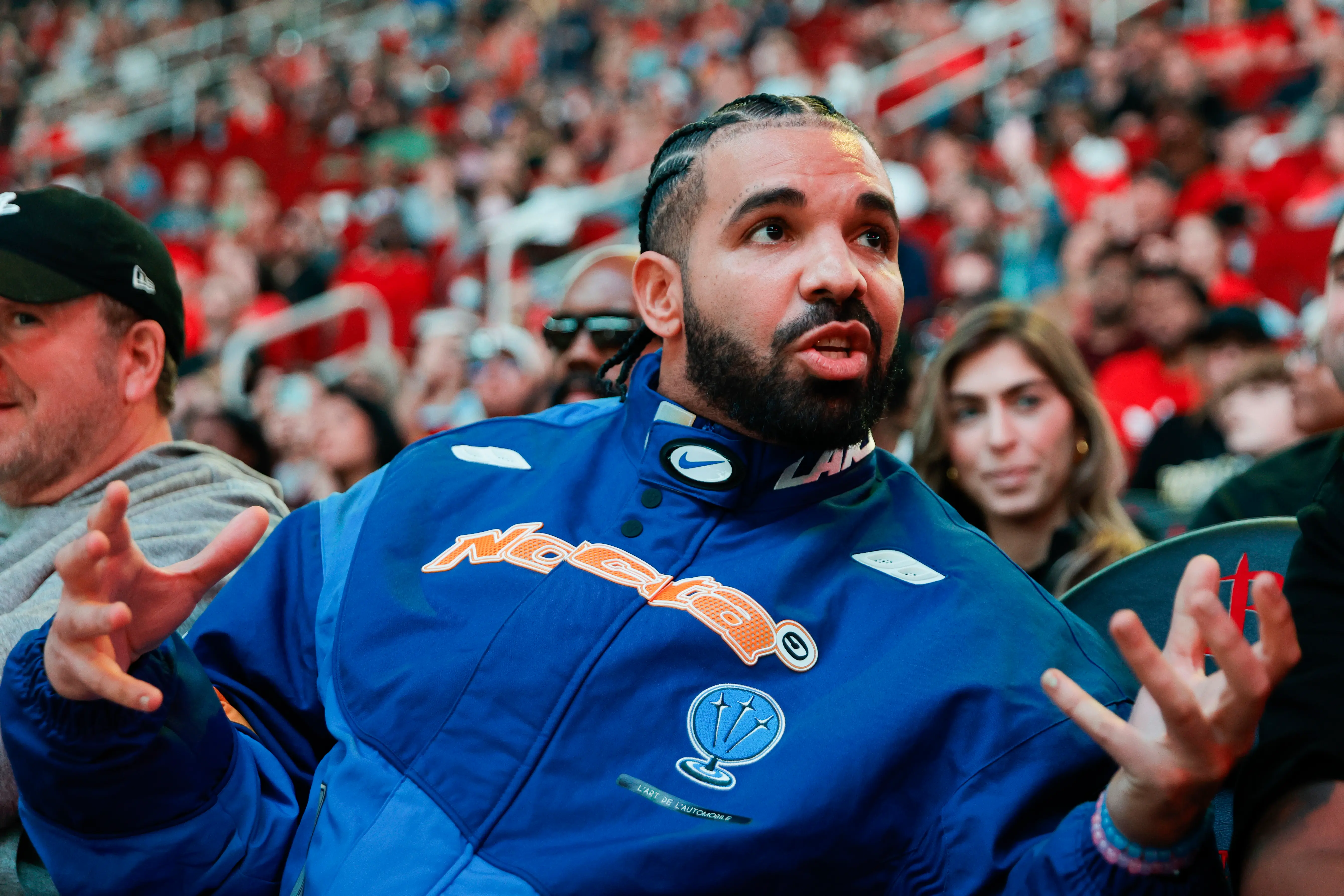 HOUSTON, TEXAS - MARCH 16: Rapper, songwriter, and icon Drake attends a game between the Houston Rockets and the Cleveland Cavaliers at Toyota Center on March 16, 2024 in Houston, Texas (Photo by Carmen Mandato/Getty Images).