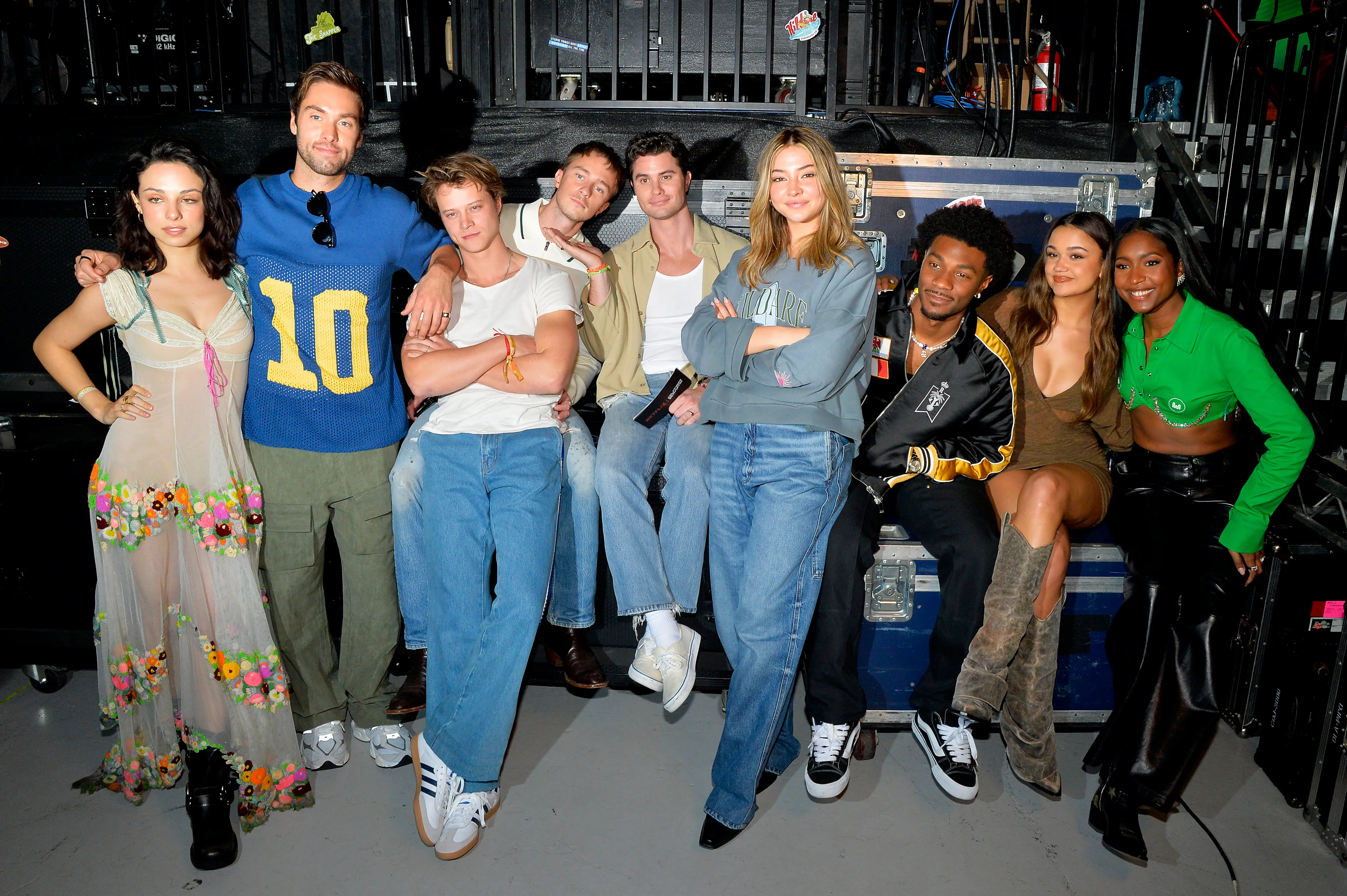 LOS ANGELES, CALIFORNIA - NOVEMBER 02: (L-R) Fiona Palomo, Austin North, Rudy Pankow, Drew Starkey, Chase Stokes, Madelyn Cline, Jonathan Daviss, Madison Bailey and Carlacia Grant attend Poguelandia 2024: A Netflix Outer Banks Experience on November 02, 2024 in Los Angeles, California.  (Photo by Jerod Harris/Getty Images for Netflix)