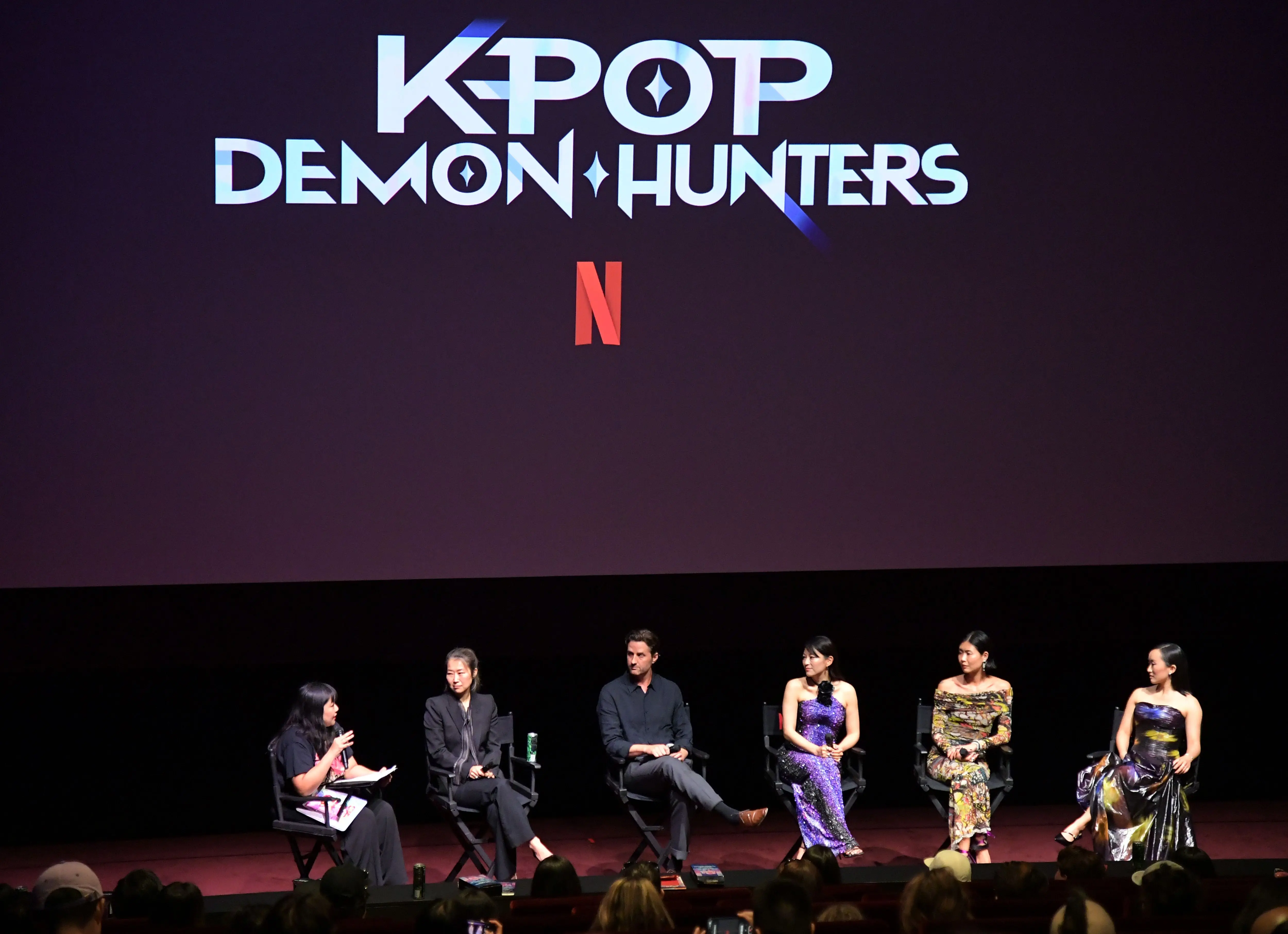 LOS ANGELES, CALIFORNIA - JUNE 16: (L-R) Moderator Laura Sirikul with Maggie Kang, Chris Appelhans, Arden Cho, May Hong and Ji-young Yoo speak during the KPop Demon Hunters Special Screening Q&amp;A at Netflix Tudum Theater on June 16, 2025 in Los Angeles, California.  (Photo by Charley Gallay/Getty Images for Netflix)