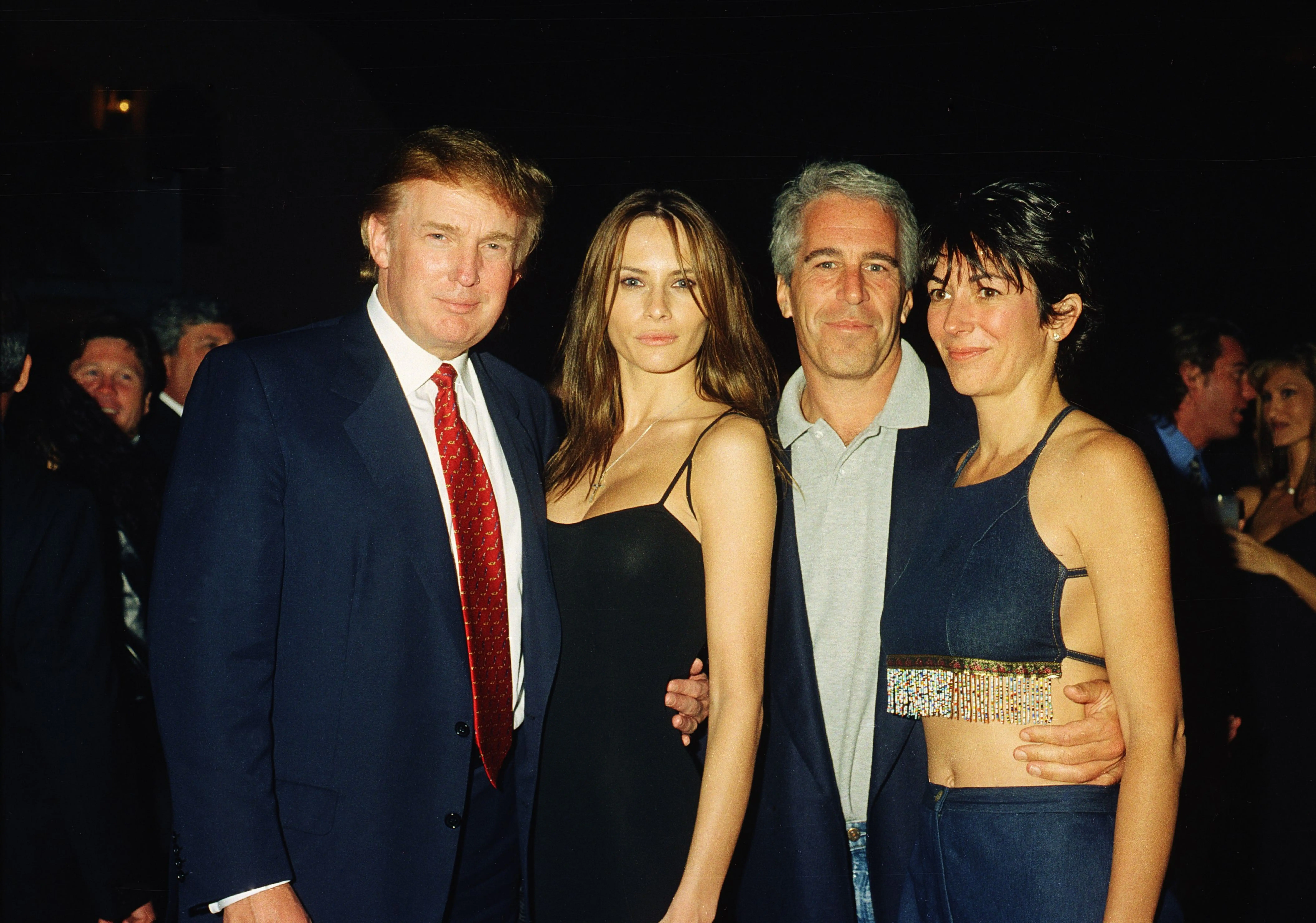 Donald Trump, Melania Trump, Jeffrey Epstein, and Ghislaine Maxwell at the Mar-a-Lago club, Palm Beach, Florida, February 12, 2000 (Image via Getty)