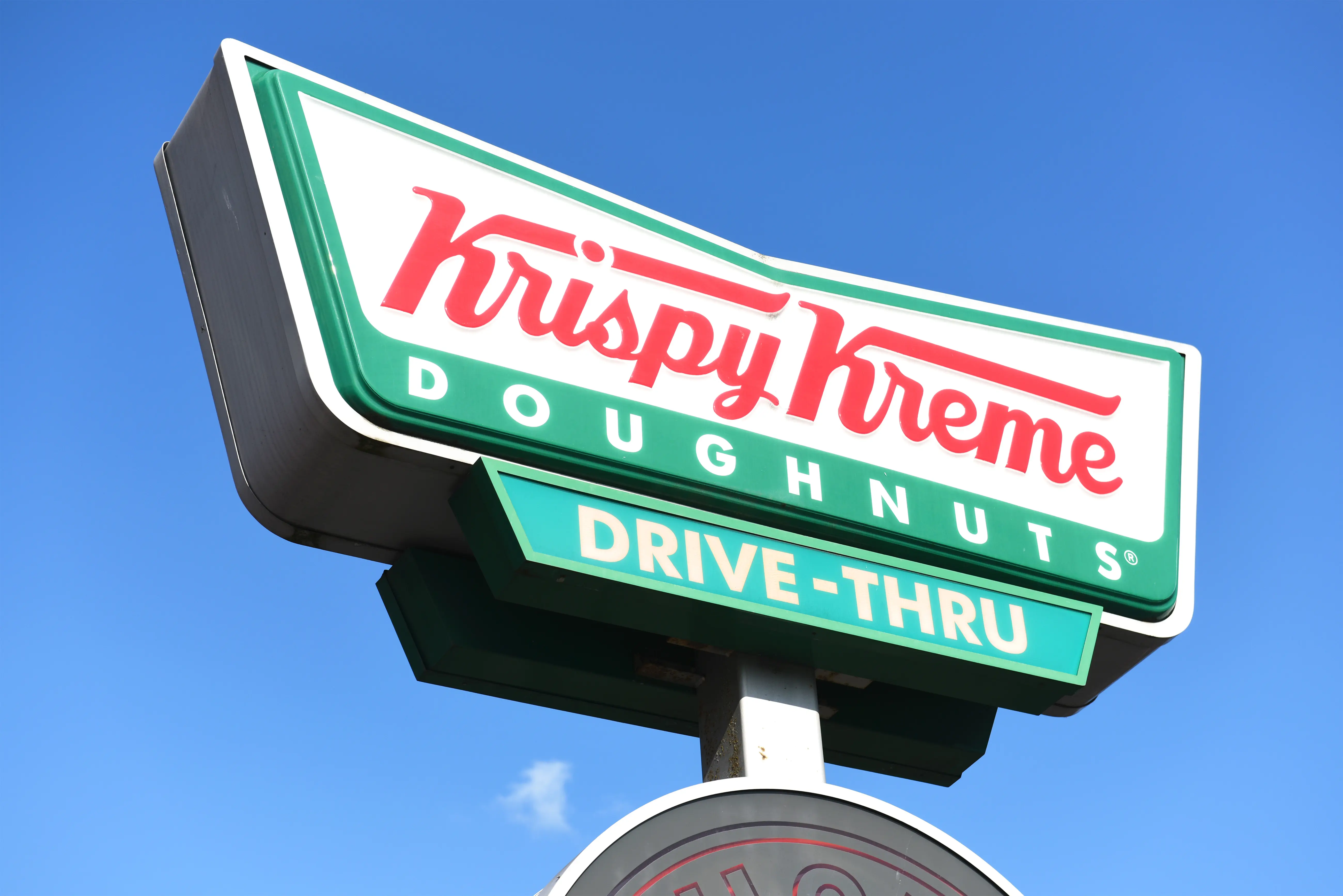 Krispy Kreme Doughnuts store sign (Photo by Peter Dazeley/Getty Images)