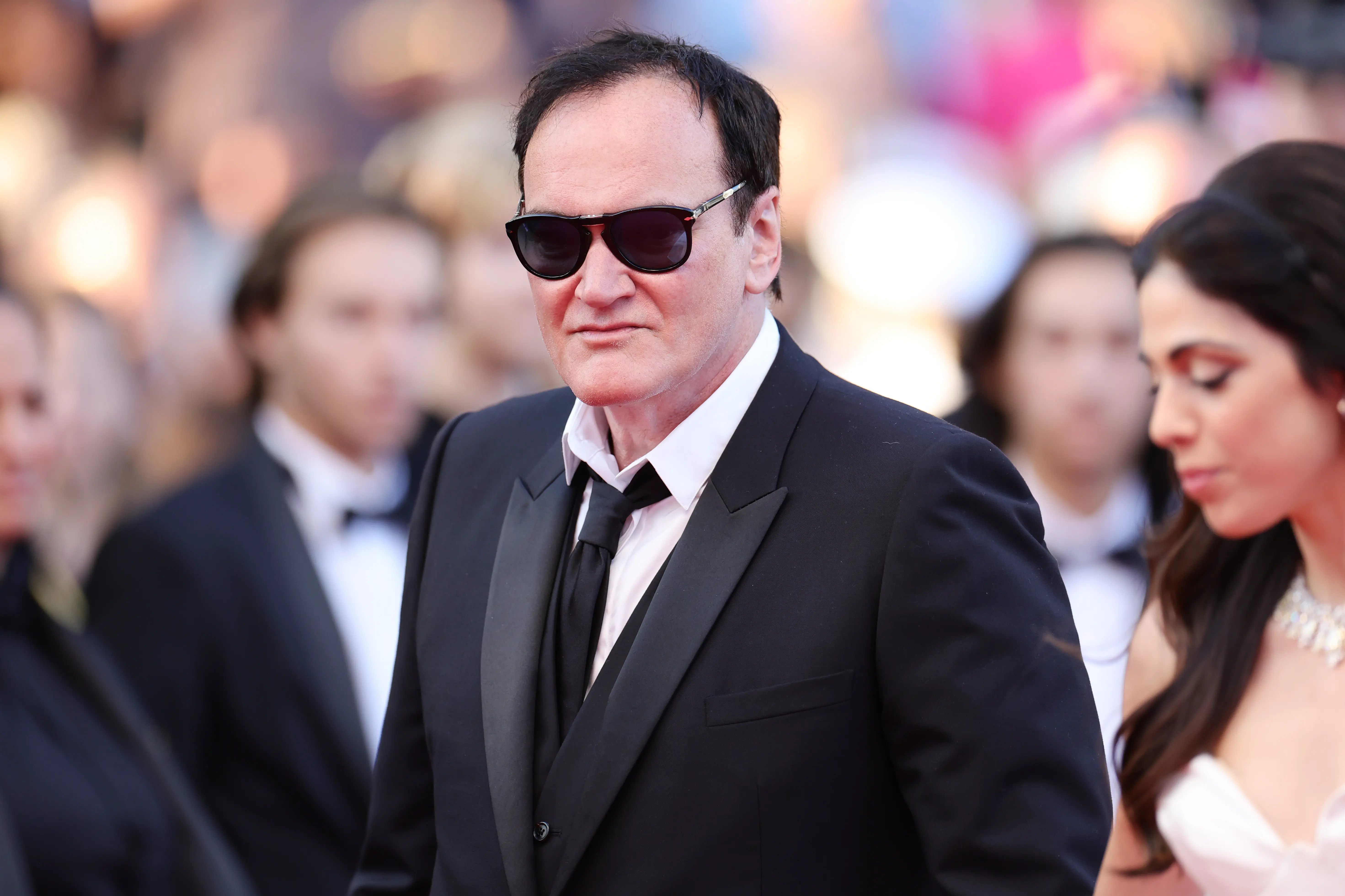 CANNES, FRANCE - MAY 27: Quentin Tarantino and Daniella Pick attend the "Elemental" screening and closing ceremony red carpet during the 76th annual Cannes film festival at Palais des Festivals on May 27, 2023 in Cannes, France. (Photo by Andreas Rentz/Getty Images)