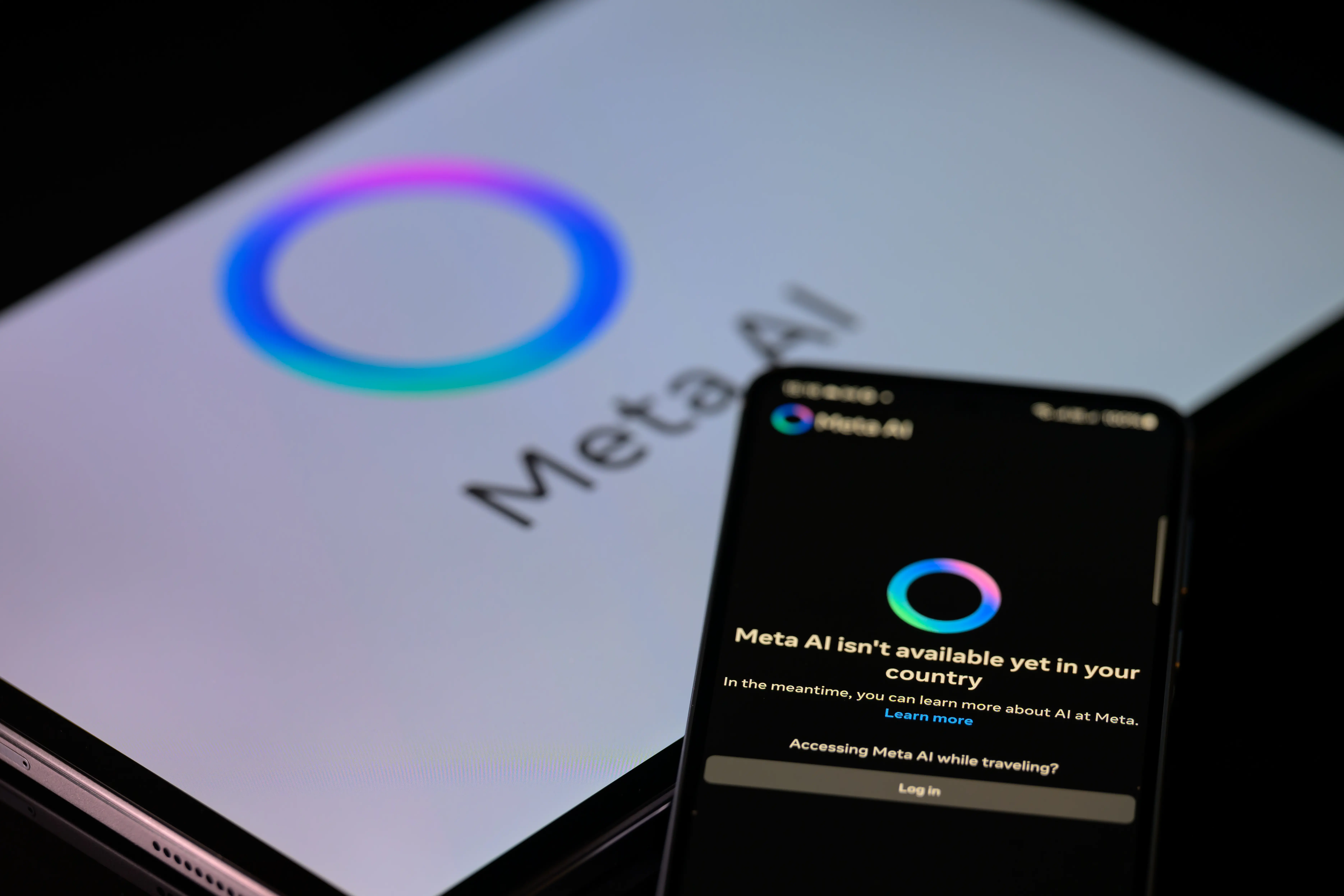 The Meta AI app is displayed on a mobile phone with the Meta AI logo visible on a tablet in this photo illustration in Brussels, Belgium, on January 26, 2025. (Photo by Jonathan Raa/NurPhoto via Getty Images)