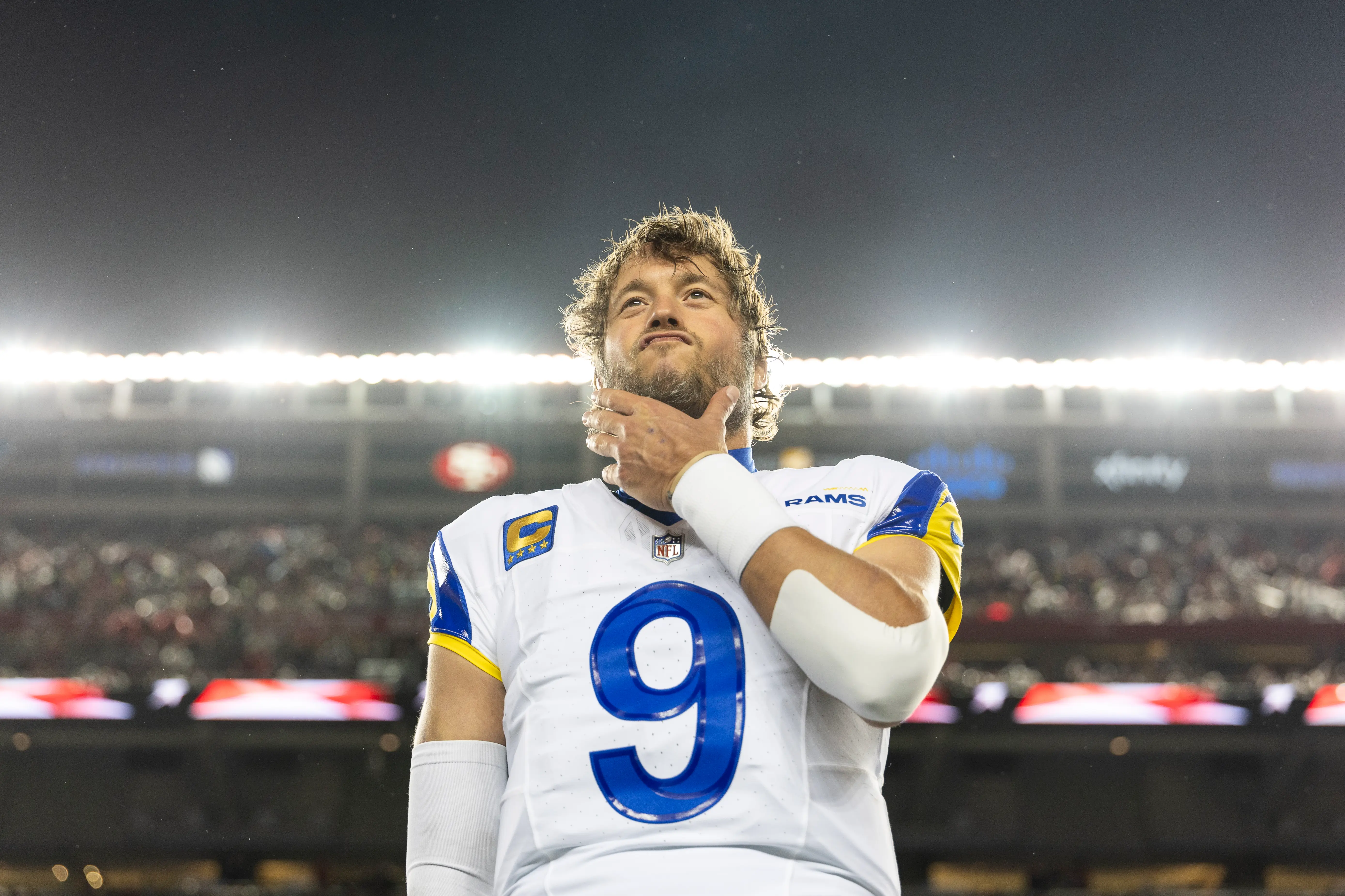 SANTA CLARA, CALIFORNIA - DECEMBER 12: Matthew Stafford #9 of the Los Angeles Rams reacts during the national anthem prior to an NFL Football game against the San Francisco 49ers at Levi's Stadium on December 12, 2024 in Santa Clara, California. (Photo by Michael Owens/Getty Images)