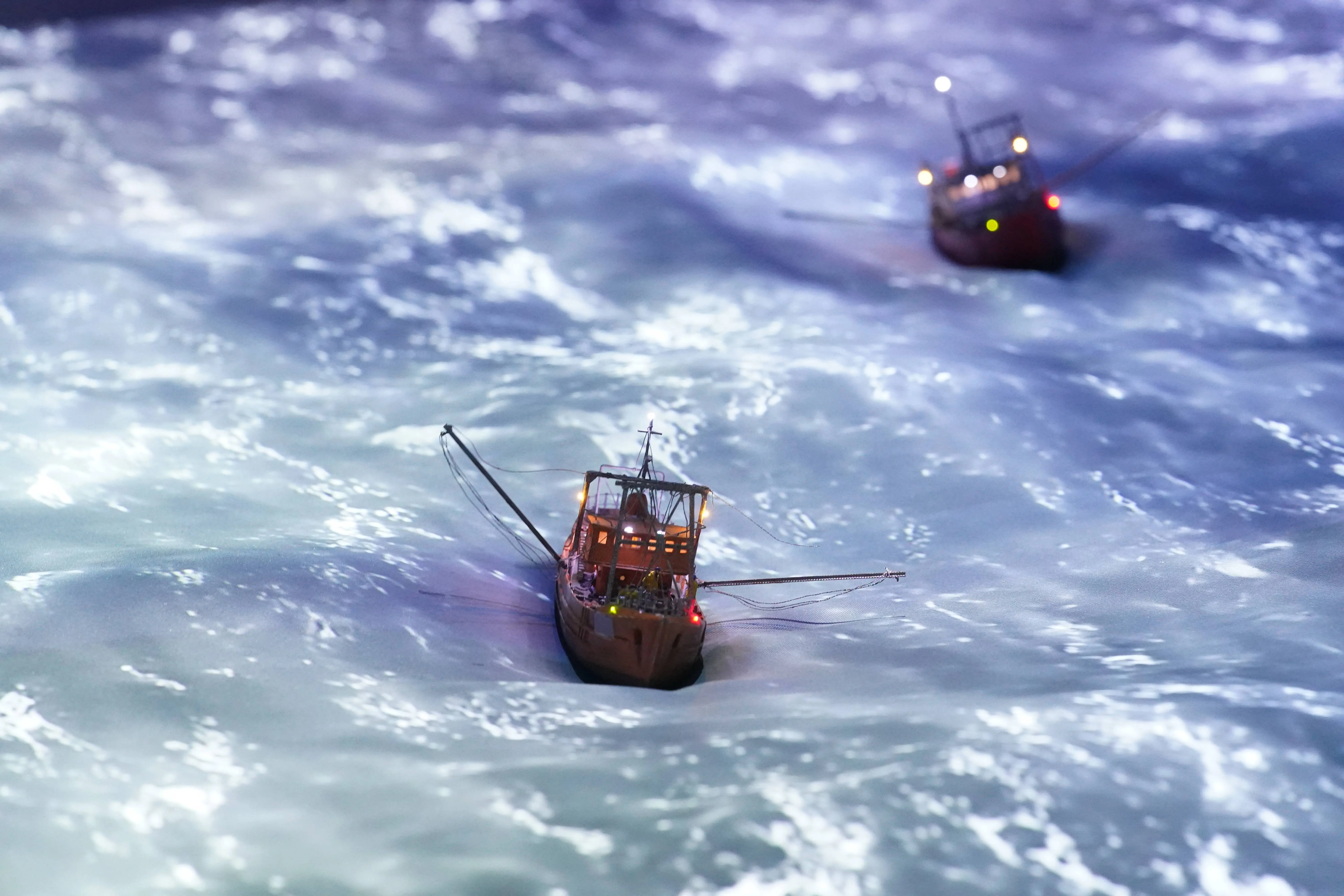 Ships sail through a thunderstorm on the Drake Passage in Antarctica in the new Patagonia and Argentina section in Miniatur Wunderland (Image via Getty)