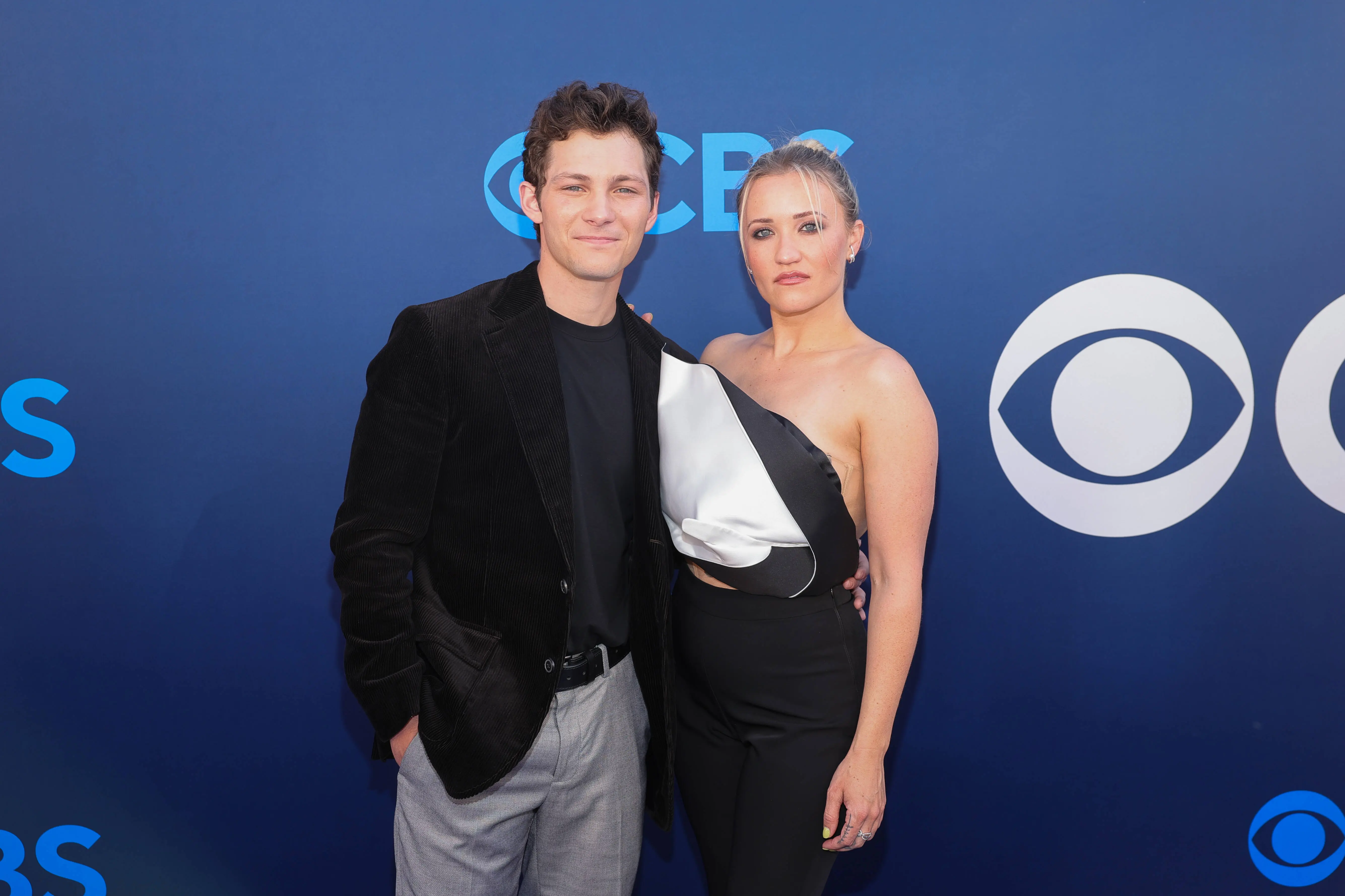 LOS ANGELES, CALIFORNIA - MAY 07: (L-R) Montana Jordan and Emily Osment arrive at CBS Fest 2025 at Paramount Studios on May 07, 2025 in Los Angeles, California. (Photo by Maya Dehlin Spach/Getty Images)