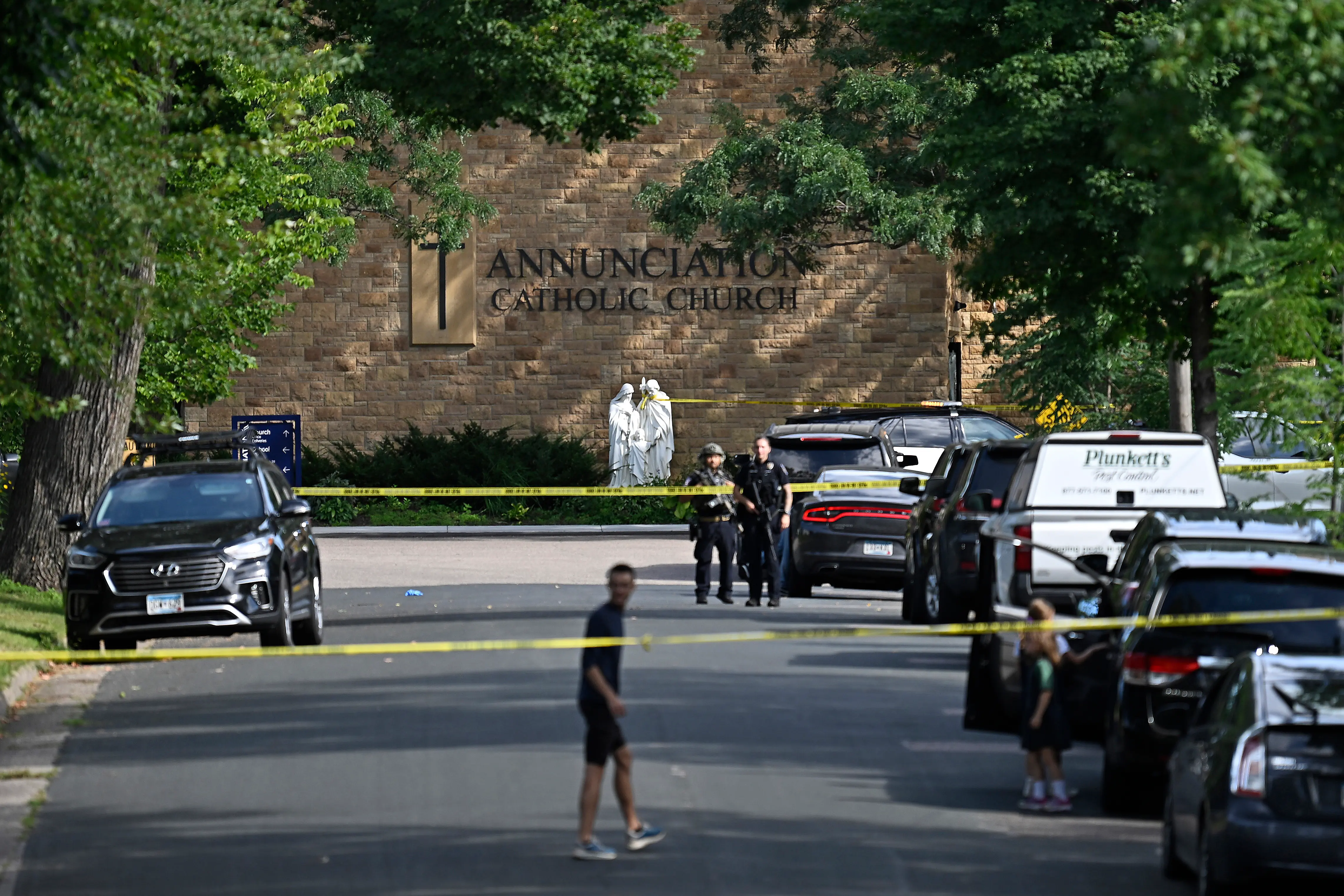 Police work the scene following a mass shooting at Annunciation Catholic School on August 27, 2025 in Minneapolis, Minnesota (Image via Getty)