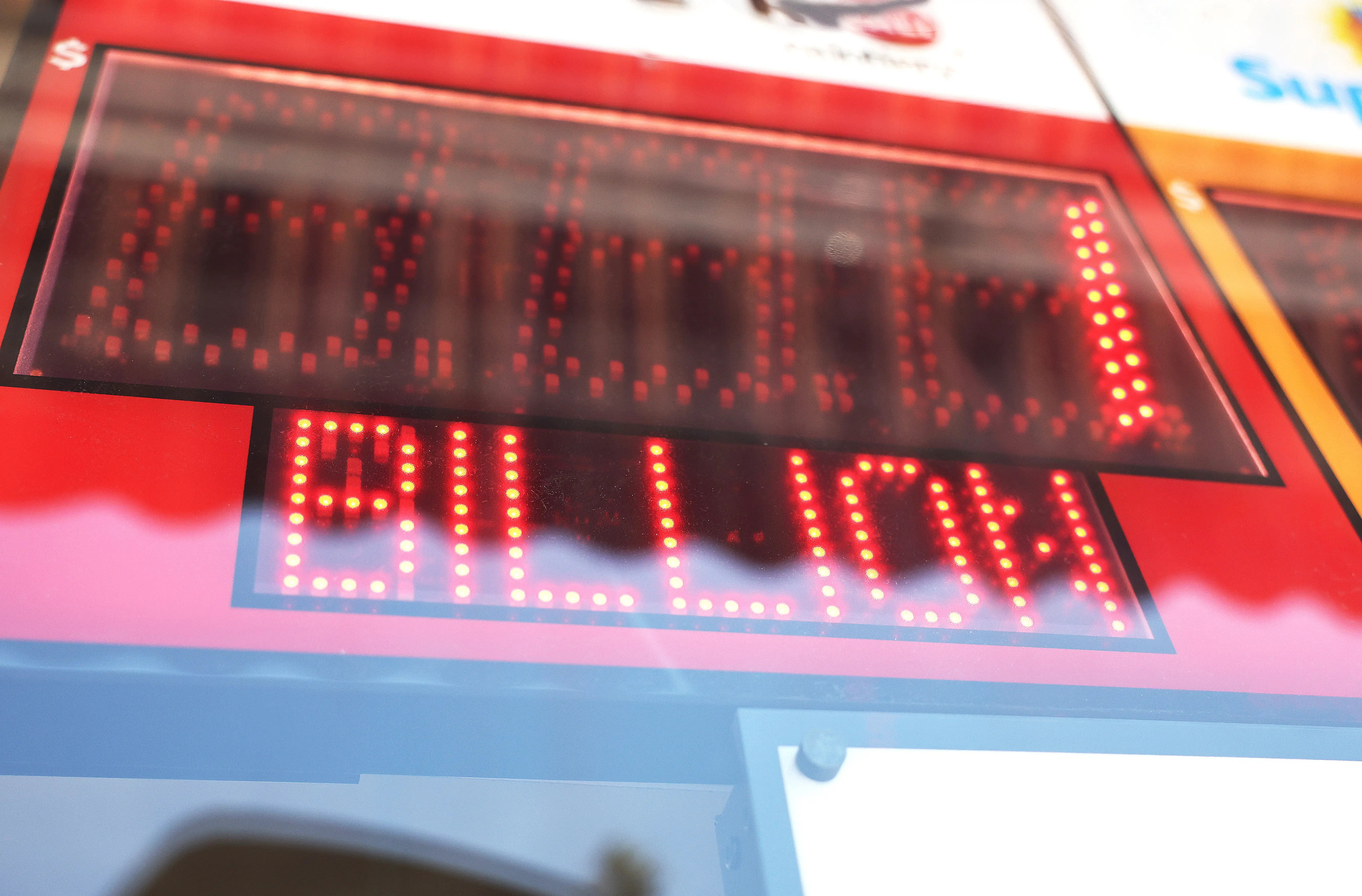 LOS ANGELES, CALIFORNIA - JULY 18: A California Lottery display shows projected winnings for the next Powerball drawing in a convenience store on July 18, 2023 in Los Angeles, California. The Powerball jackpot for the drawing on July 19th is now estimated to be $1 billion after three months of drawings without a winner. (Photo by Mario Tama/Getty Images)