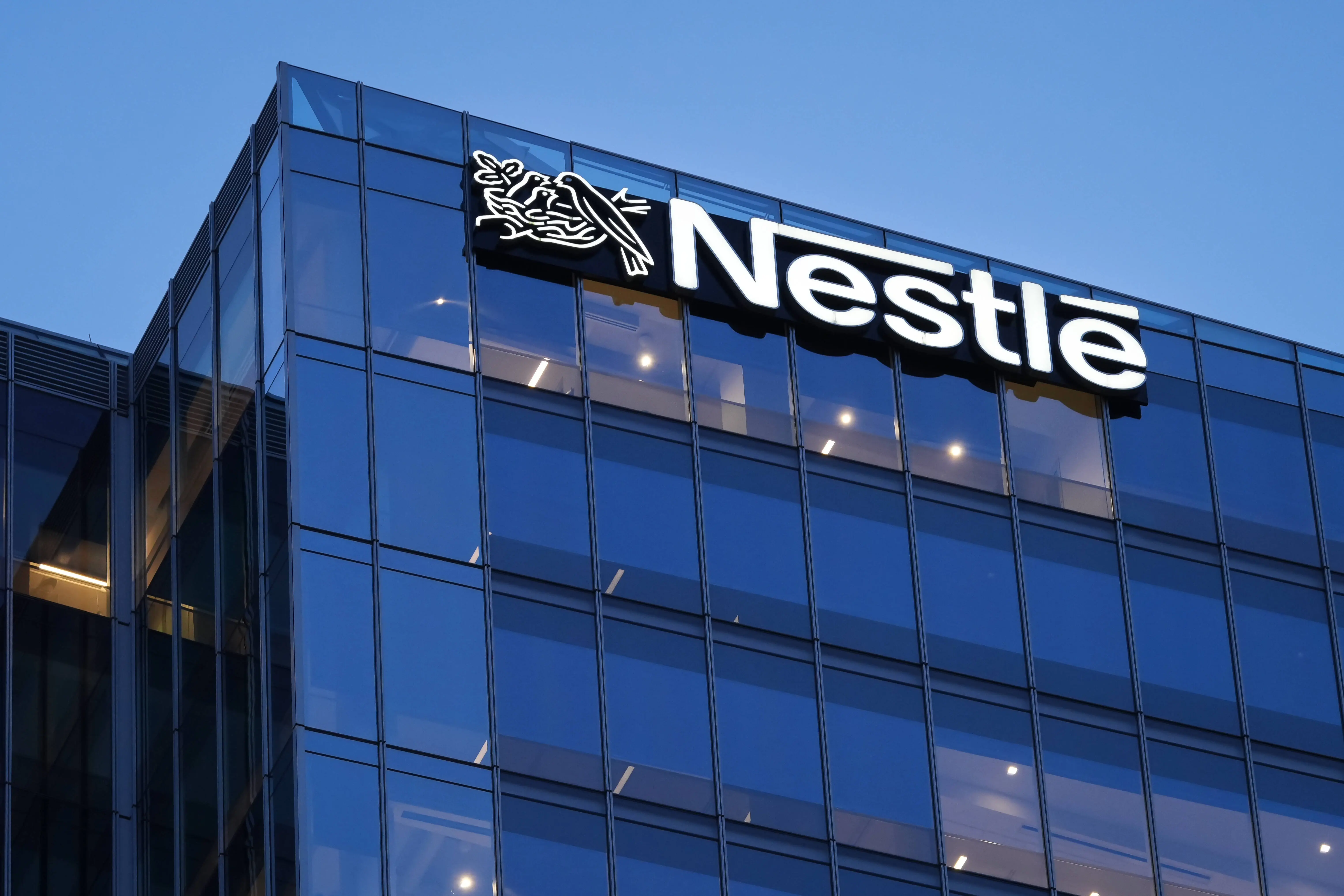 ARLINGTON, VA - May 15, 2025: The corporate logo for the Nestlé food company is seen on the top of their U.S. headquarters building on May 16, 2025, in Arlington, VA. (Photo by J. David Ake/Getty Images)