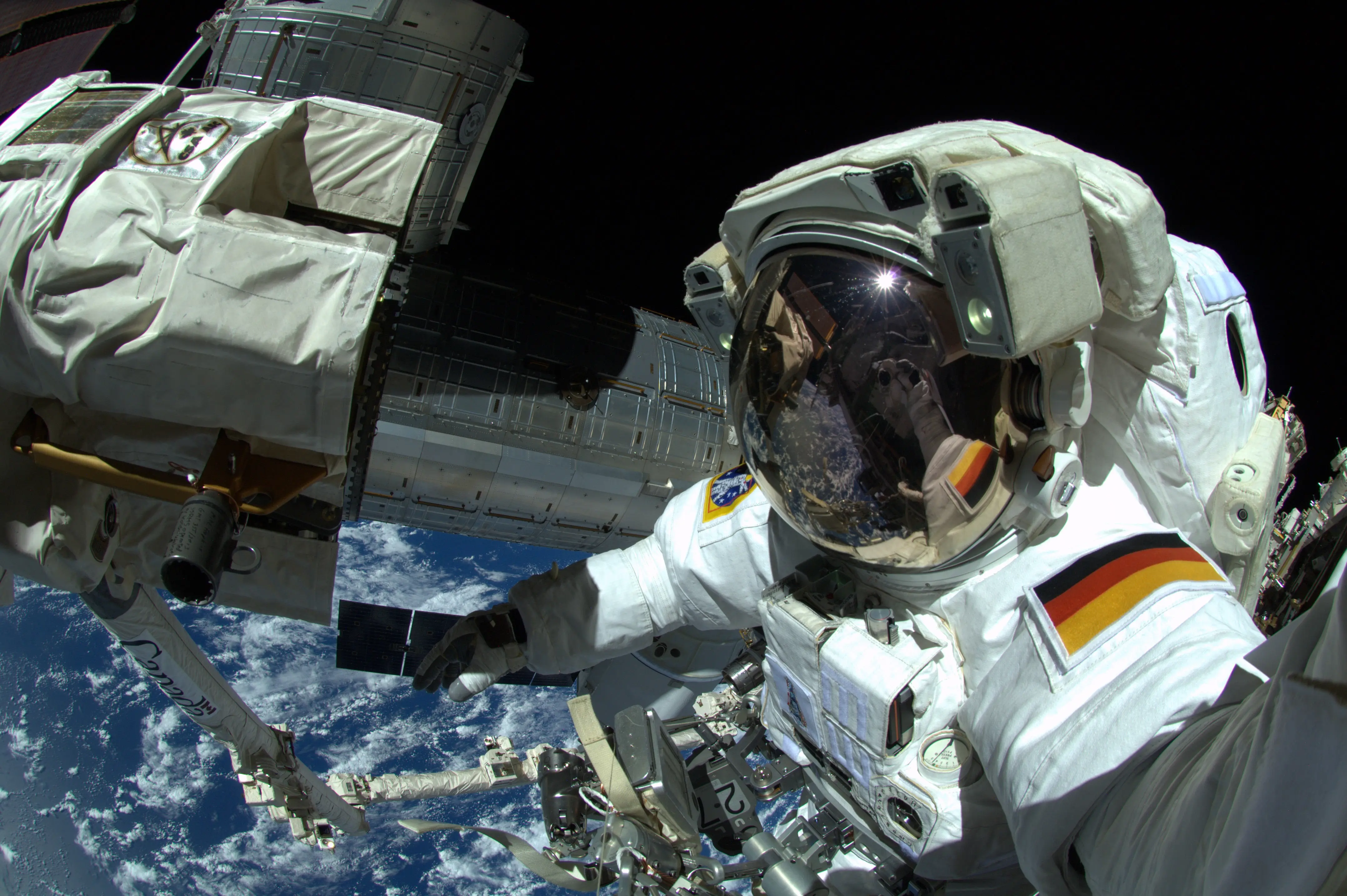 IN SPACE - OCTOBER 7: (EDITORIAL USE ONLY) In this handout photo provided by the European Space Agency (ESA), German ESA astronaut Alexander Gerst takes a 'selfie' during his spacewalk, whilst aboard the International Space Station (ISS) on October 7, 2014 in Space. Gerst returned to earth on November 10, 2014 after spending six months on the International Space Station completing an extensive scientific programme, known as the 'Blue Dot' mission (after astronomer Carl Sagan's description of Earth, as seen on a photograph taken by the Voyager probe from six billion kilometres away). (Photo by Alexander Gerst / ESA via Getty Images)