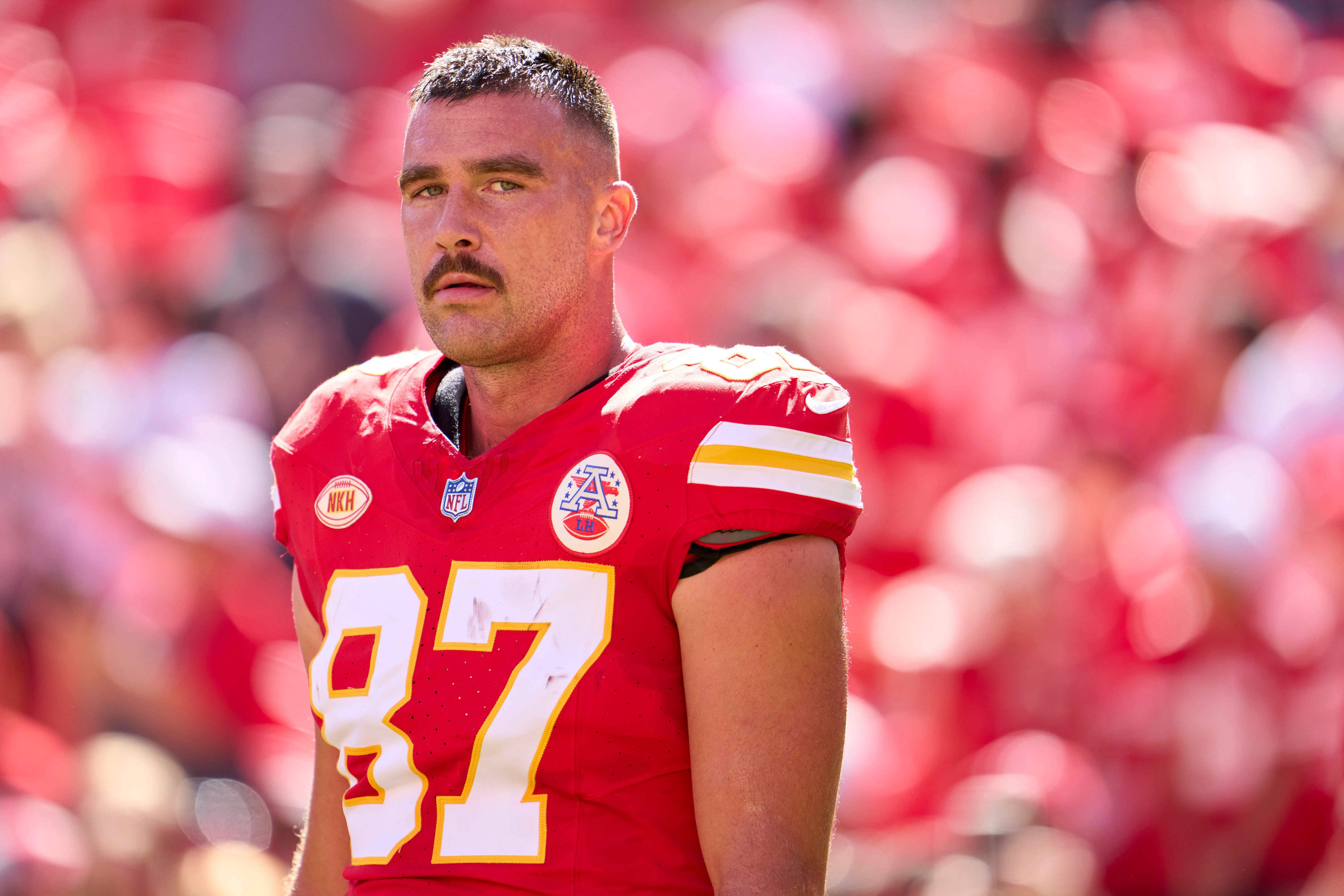 KANSAS CITY, MO - SEPTEMBER 24: Travis Kelce #87 of the Kansas City Chiefs looks on before kickoff against the Chicago Bears at GEHA Field at Arrowhead Stadium on September 24, 2023 in Kansas City, Missouri. (Photo by Cooper Neill/Getty Images)