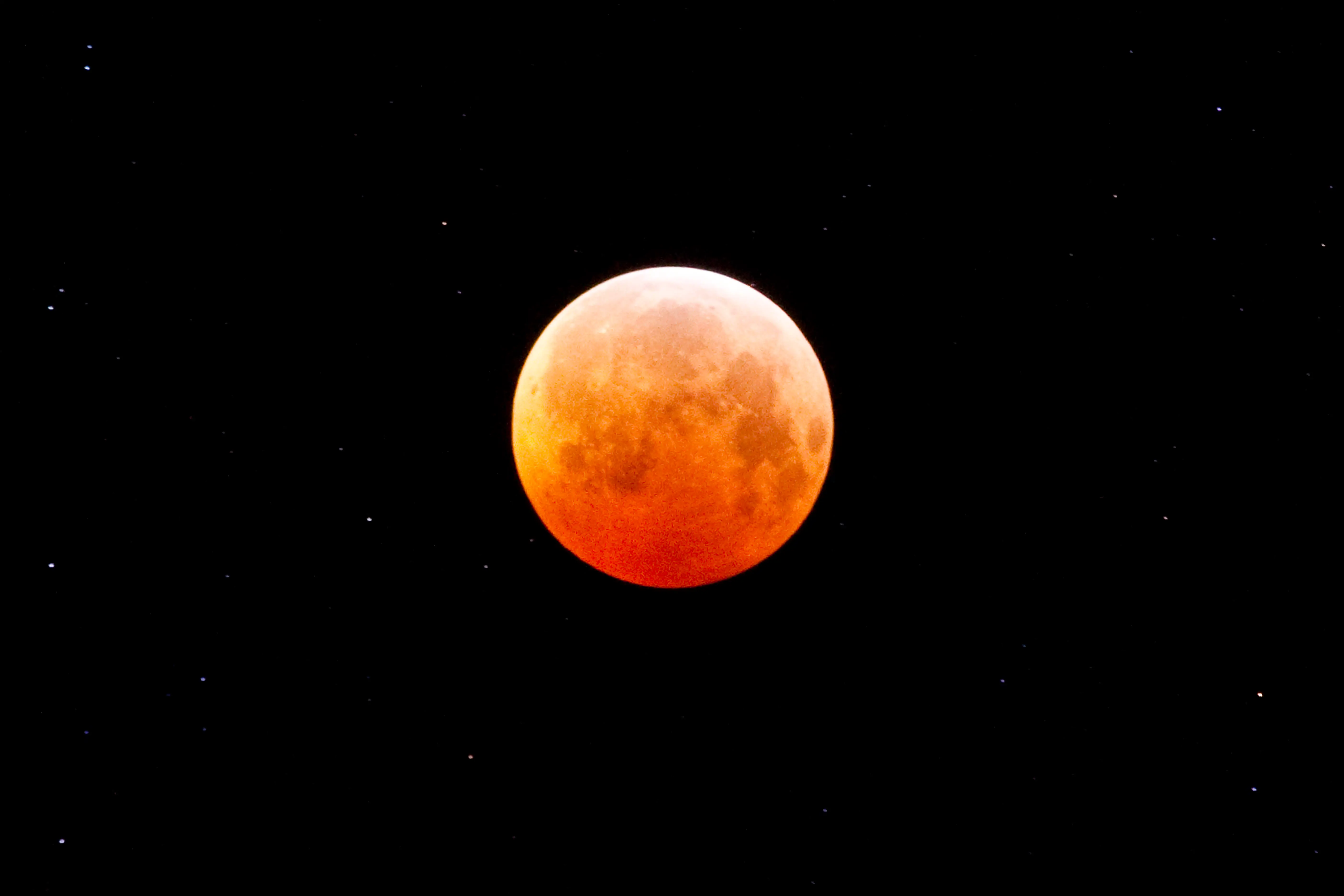 TRUCKEE, CA - DECEMBER 21: A total lunar eclipse occurs as the full moon is shadowed by the Earth on the arrival of the Winter Solstice, the shortest day of the year, on December 21, 2010 in Truckee, California. The lunar eclipse has not coincided with the Winter Solstice since 1638.  (Photo by Michael Nagle/Getty Images)