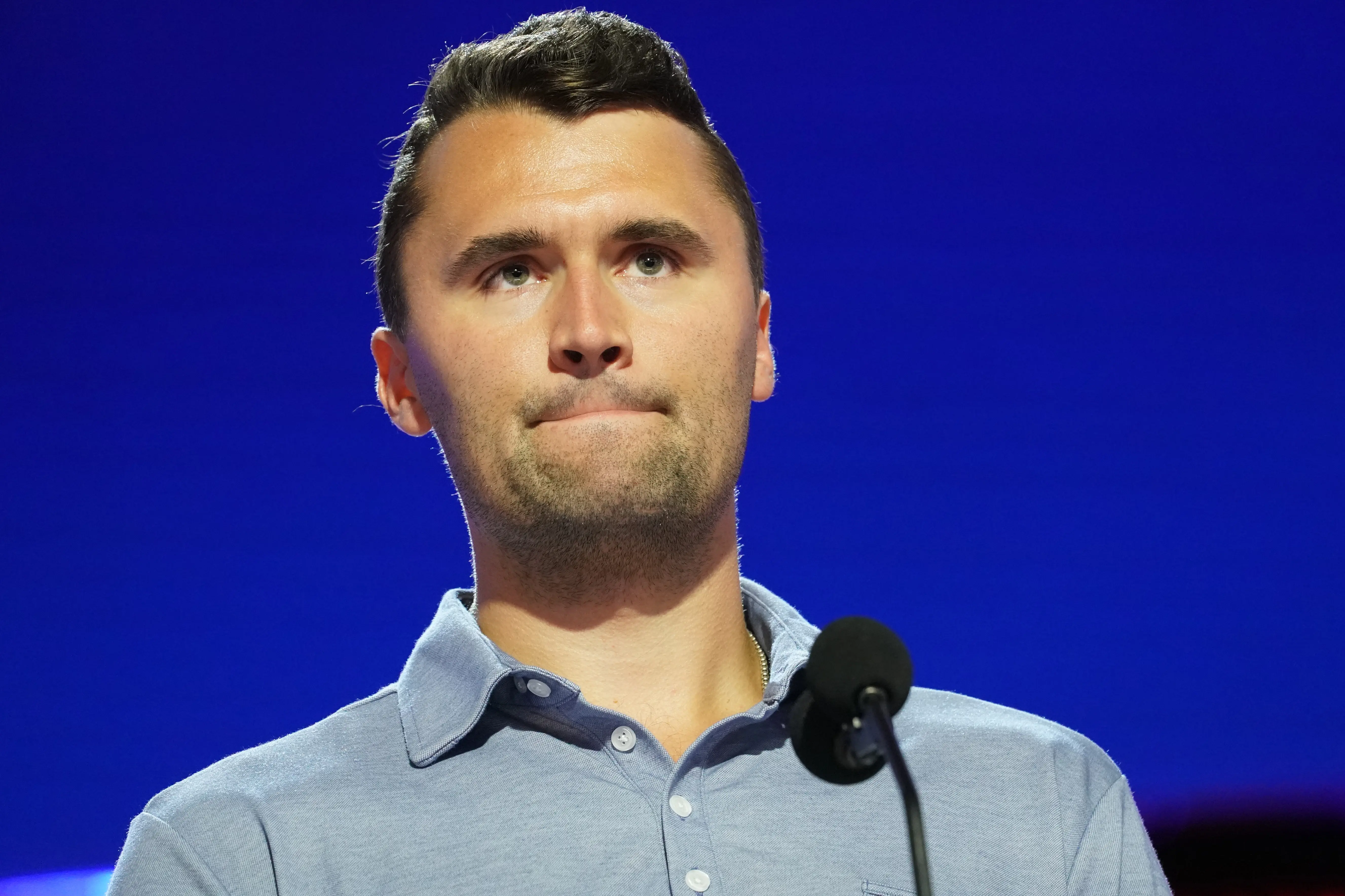 Charlie Kirk is seen onstage at the Fiserv Forum during preparations for the Republican National Convention (RNC) (Image via Getty)