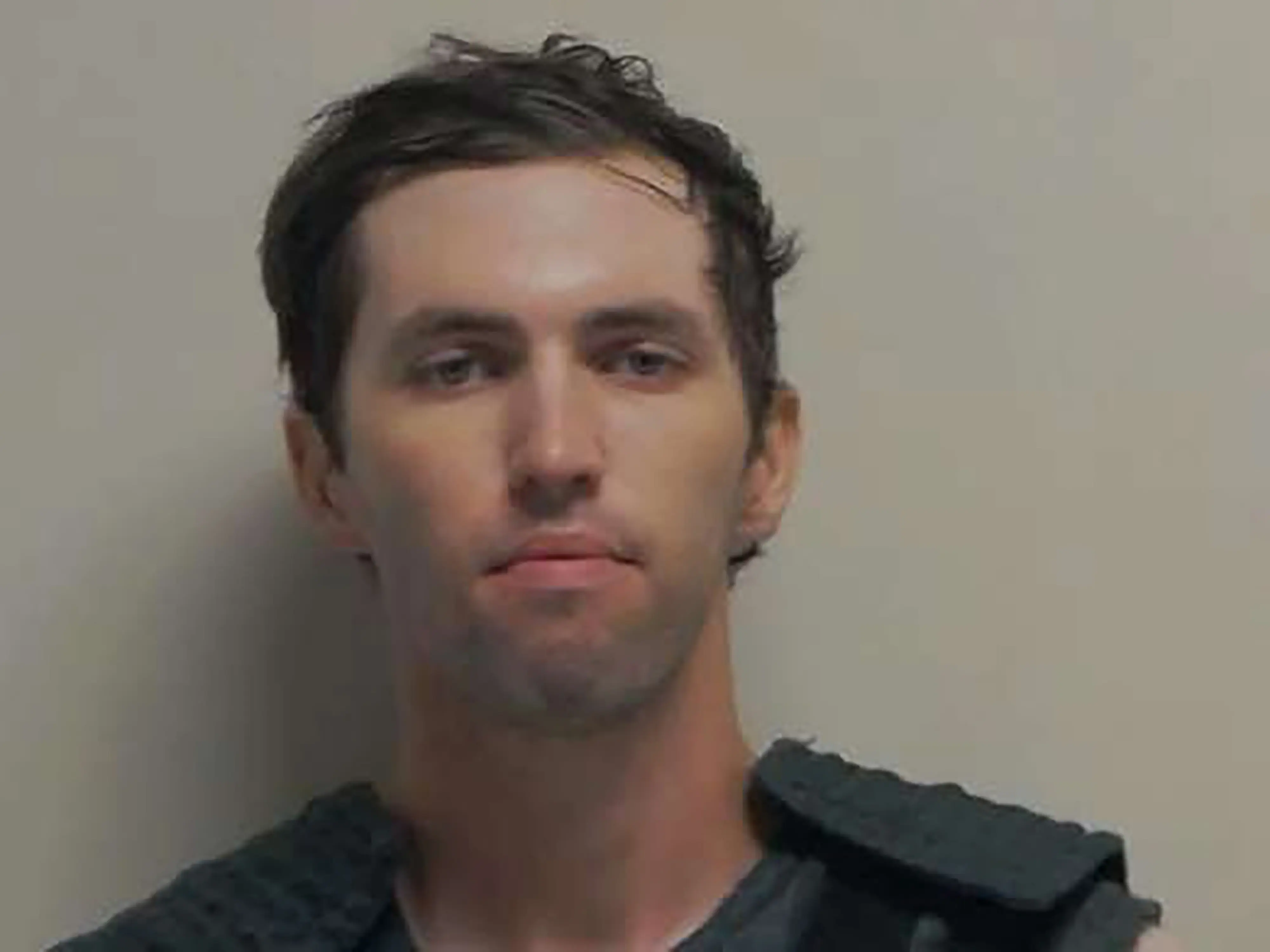 SPANISH FORK, UTAH - SEPTEMBER 12: (EDITOR'S NOTE: This Handout image was provided by a third-party organization and may not adhere to Getty Images' editorial policy.) In this handout image provided by the Office of the Governor of Utah, Tyler Robinson stands for a booking photo on September 12, 2025 in Spanish Fork, Utah. Political activist Charlie Kirk, founder of Turning Point USA, was speaking at his "American Comeback Tour" on the campus of Utah Valley University when he was shot in the neck and killed on September 10, 2025 in Orem, Utah. (Photo by Office of the Governor of Utah via Getty Images)