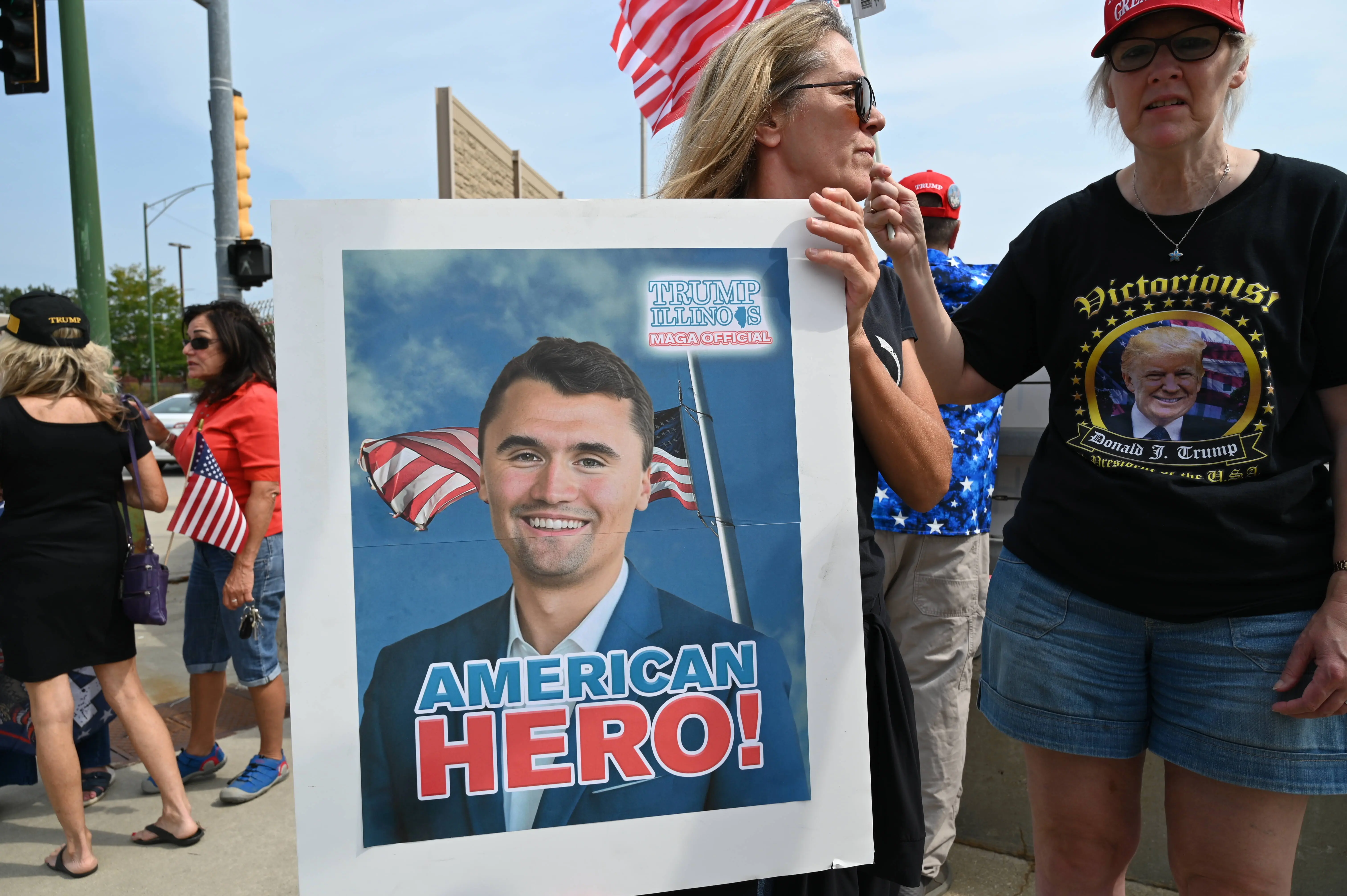 Supporters of President Donald Trump gather for a rally in Park Ridge, Illinois, United States on September 13, 2025, to honor slain conservative activist Charlie Kirk. (Photo by Jacek Boczarski/Anadolu via Getty Images)