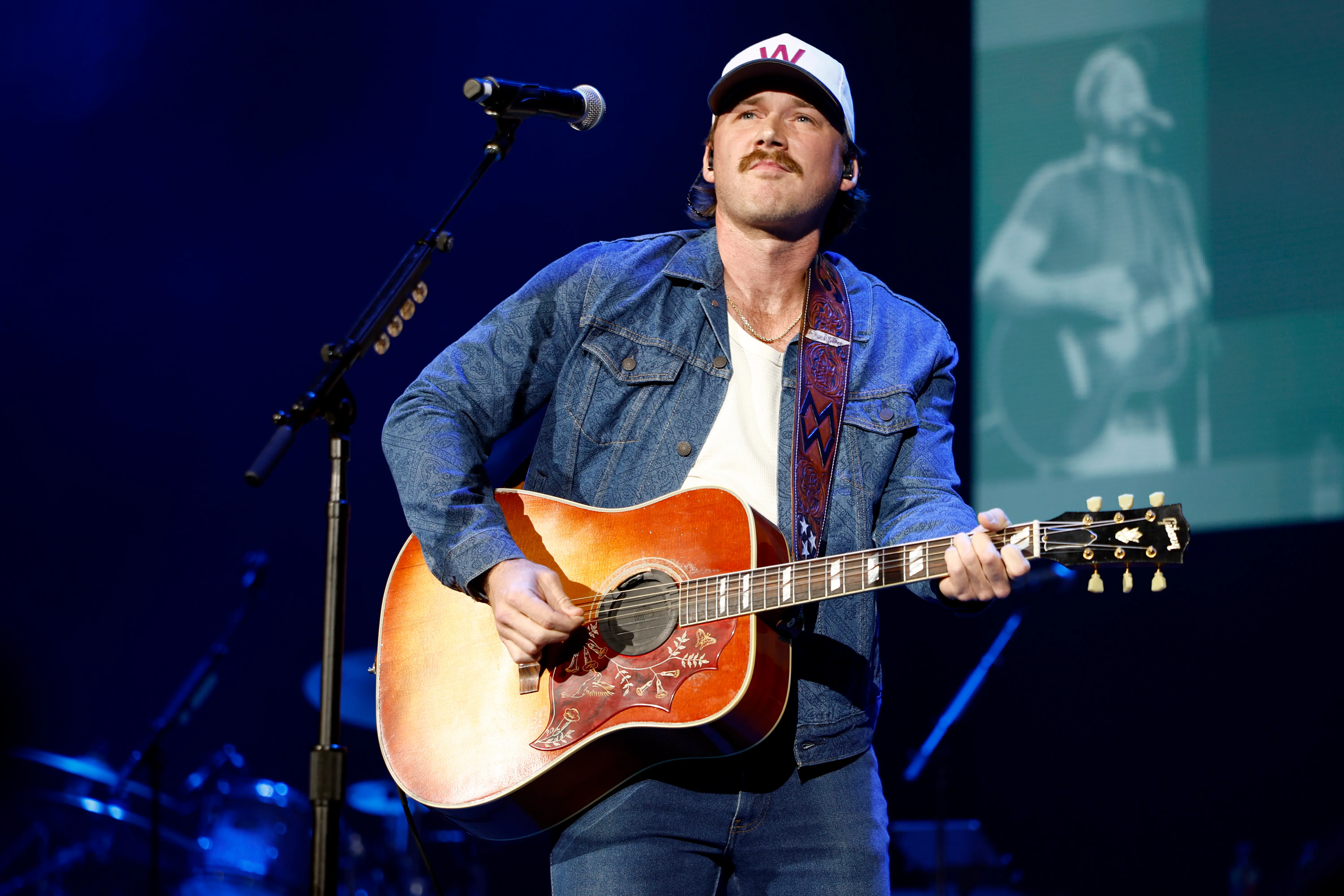 Morgan Wallen performs onstage for the 16th Annual Darius and Friends St. Jude Benefit (Image via Getty)