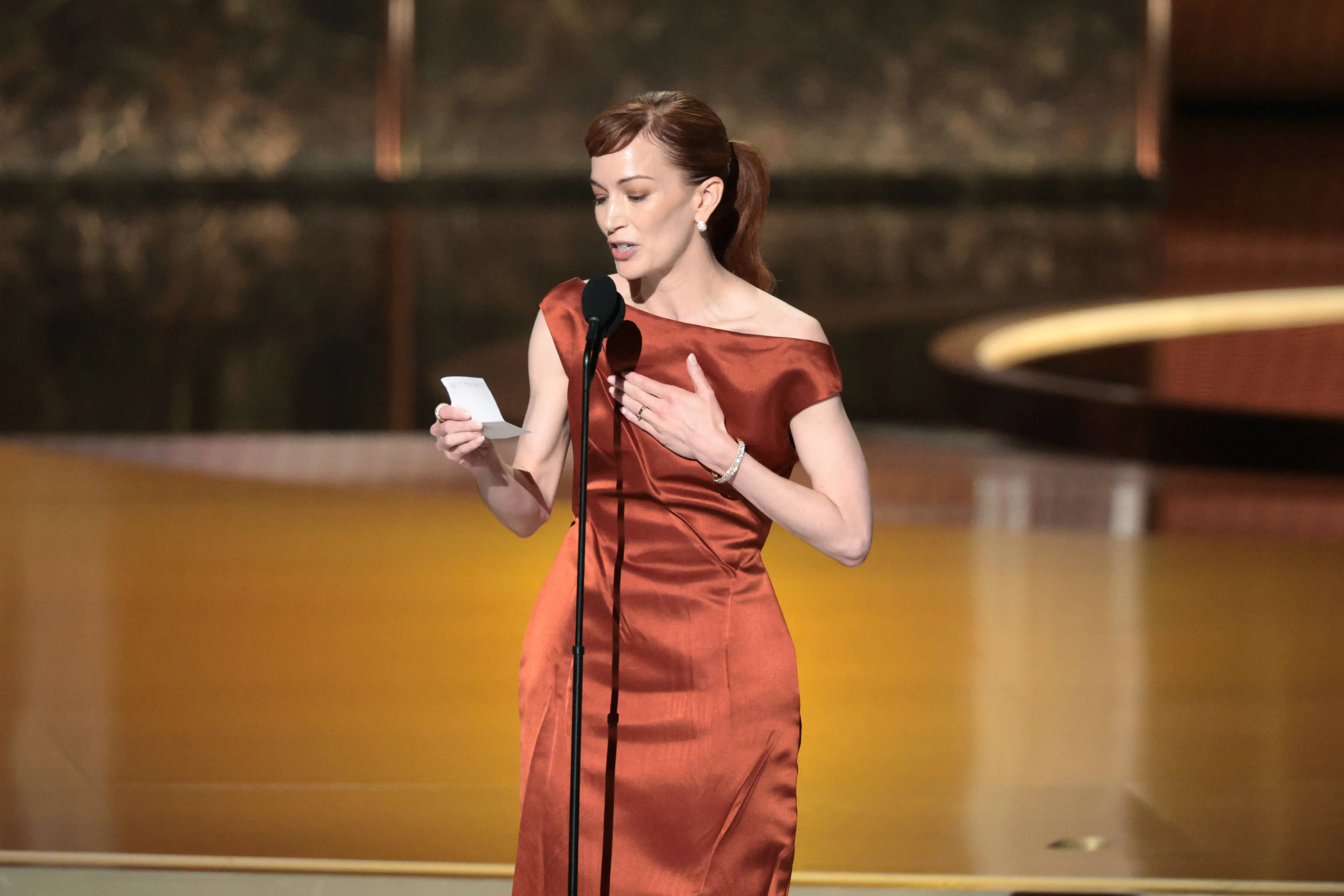 Los Angeles, CA   September 14, 2025  Britt Lower accepts the award for outstanding lead actress in a drama series for "Severance" during the show at the 77th Primetime Emmy Awards at the Peacock Theater in Los Angeles, CA, Sunday, Sept. 14, 2025. (Myung J. Chun / Los Angeles Times via Getty Images)