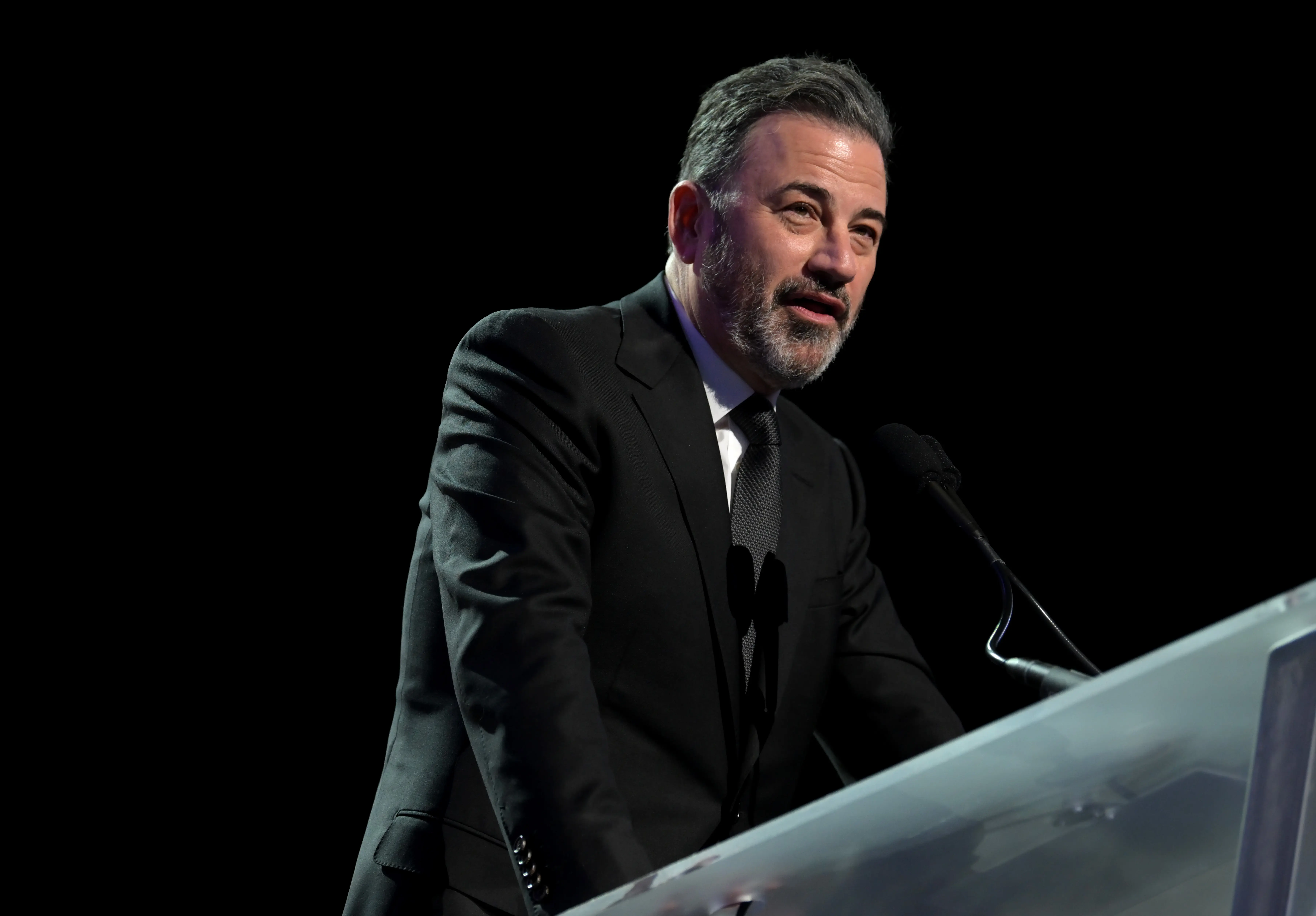 LAS VEGAS, NEVADA - FEBRUARY 22: Jimmy Kimmel performs onstage as Keep Memory Alive hosts star-studded lineup at annual "Power Of Love" gala at MGM Grand Garden Arena on February 22, 2025 in Las Vegas, Nevada.  (Photo by Bryan Steffy/Getty Images for Keep Memory Alive)