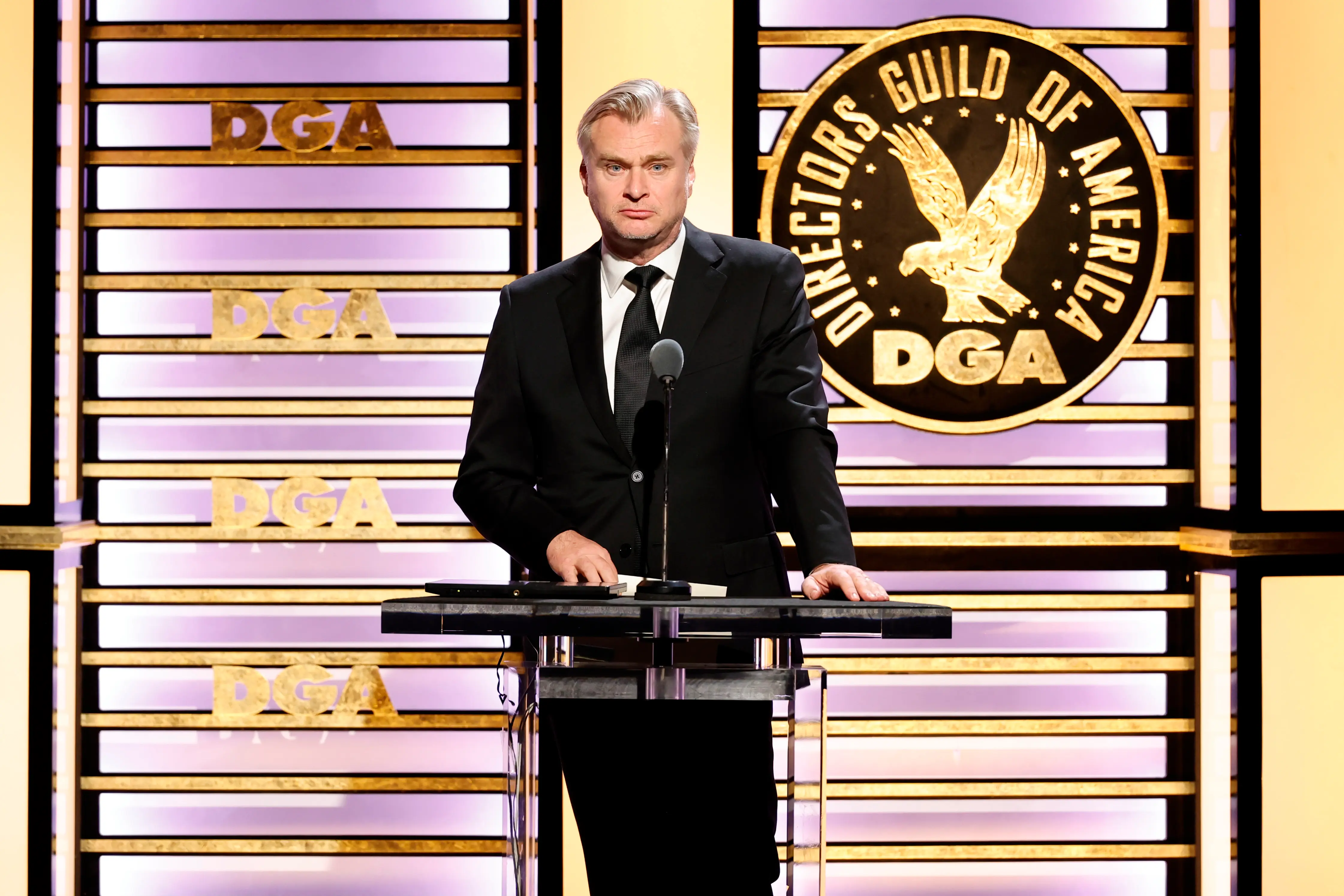 BEVERLY HILLS, CALIFORNIA - FEBRUARY 08: Christopher Nolan speaks onstage during the 77th Annual Directors Guild of America Awards at The Beverly Hilton on February 08, 2025 in Beverly Hills, California.  (Photo by Emma McIntyre/Getty Images for DGA)
