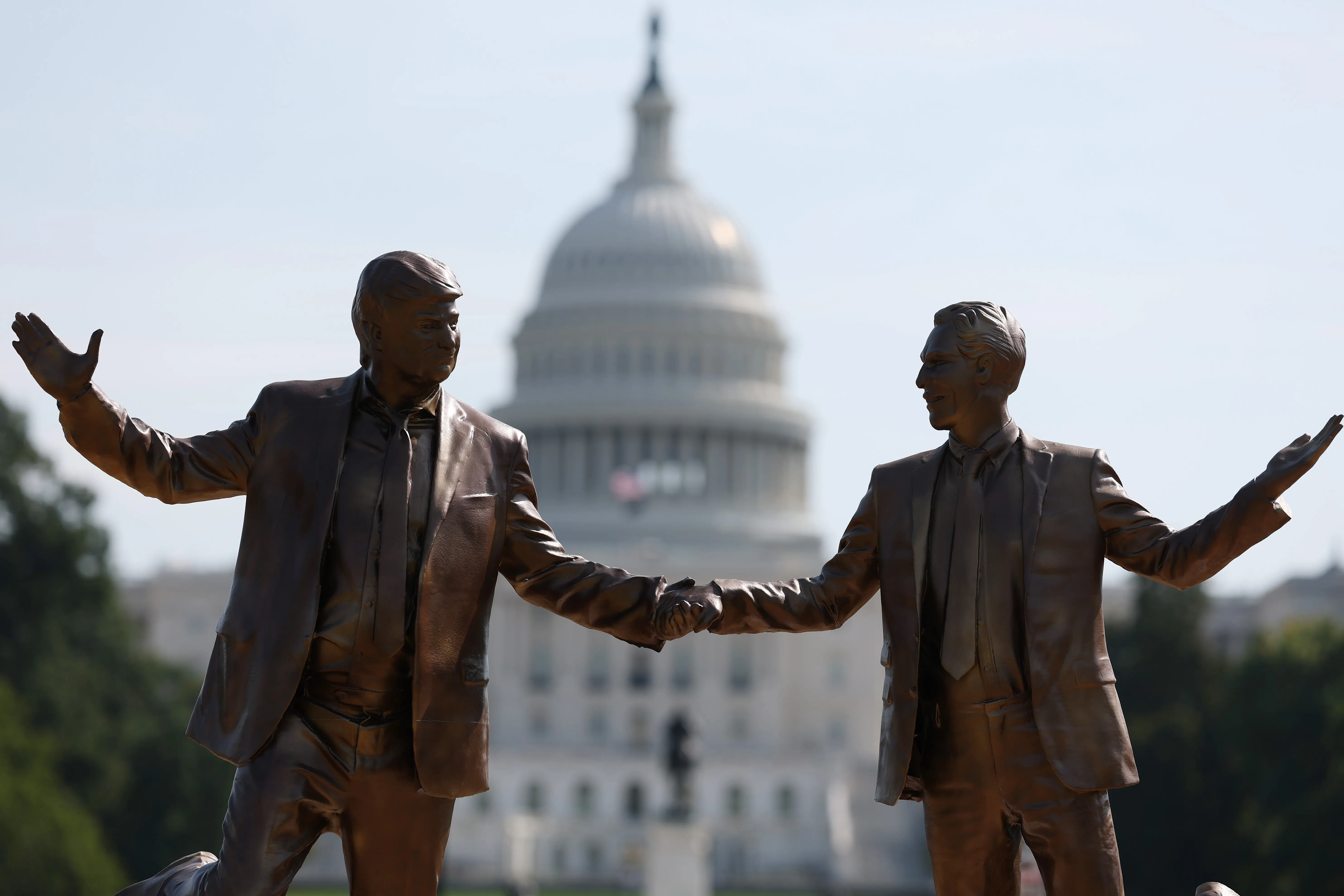 A statue depicting U.S. President Donald Trump and Jeffrey Epstein holding hands is seen near the U.S. Capitol on September 23, 2025 in Washington, DC. (Photo by Anna Moneymaker/Getty Images)
