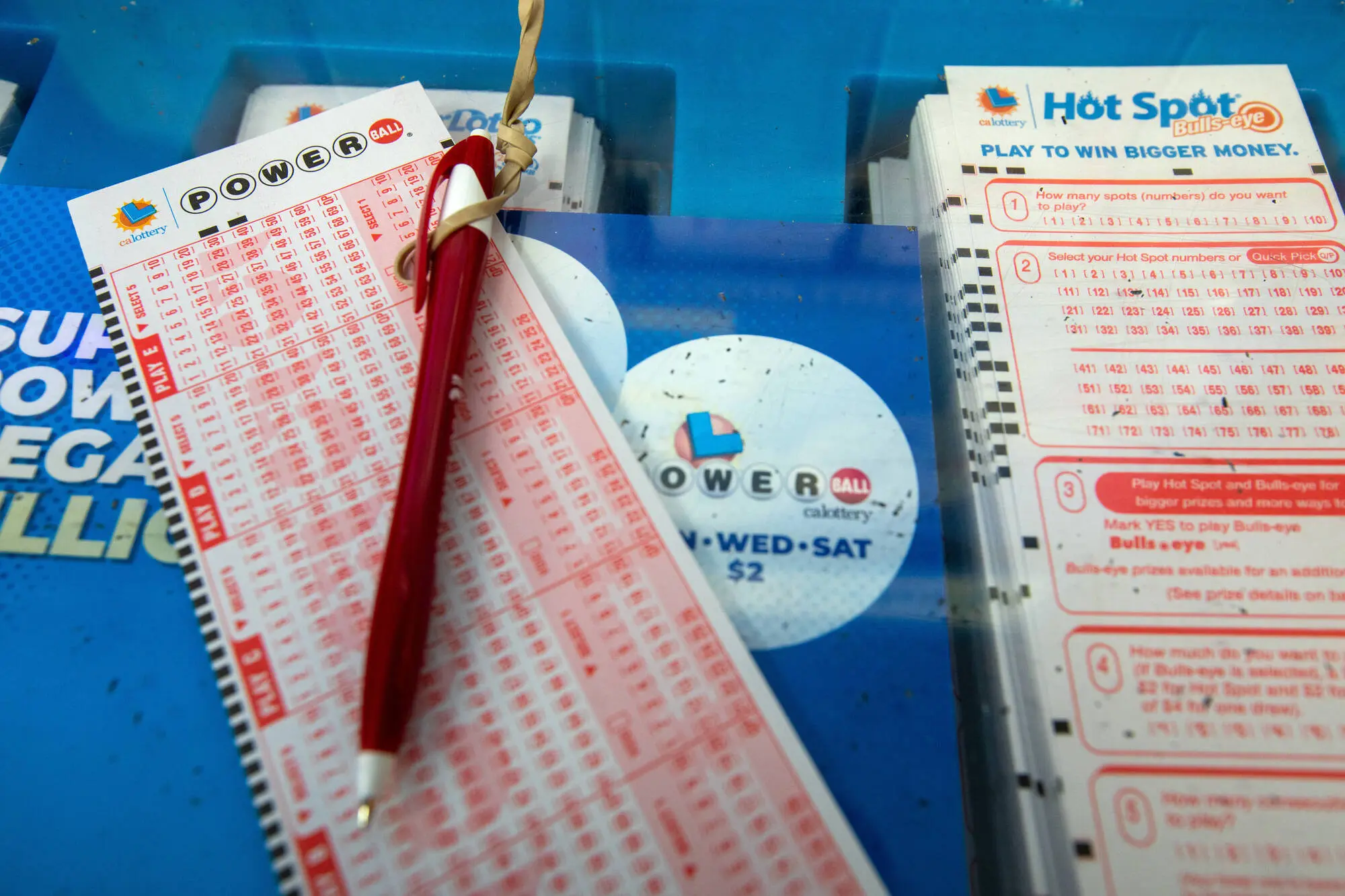 South Pasadena, CA - October 01:   Powerball and Mega Millions lotto tickets are sold at Foremost Liquor Store on Sunday, Oct. 1, 2023, in South Pasadena, CA. The Powerball lottery has reached the 1 billion mark with an estimated $1.04 billion jackpot, for the next drawing on Monday night after no grand prize winner in Saturday's drawing.  (Francine Orr / Los Angeles Times via Getty Images)