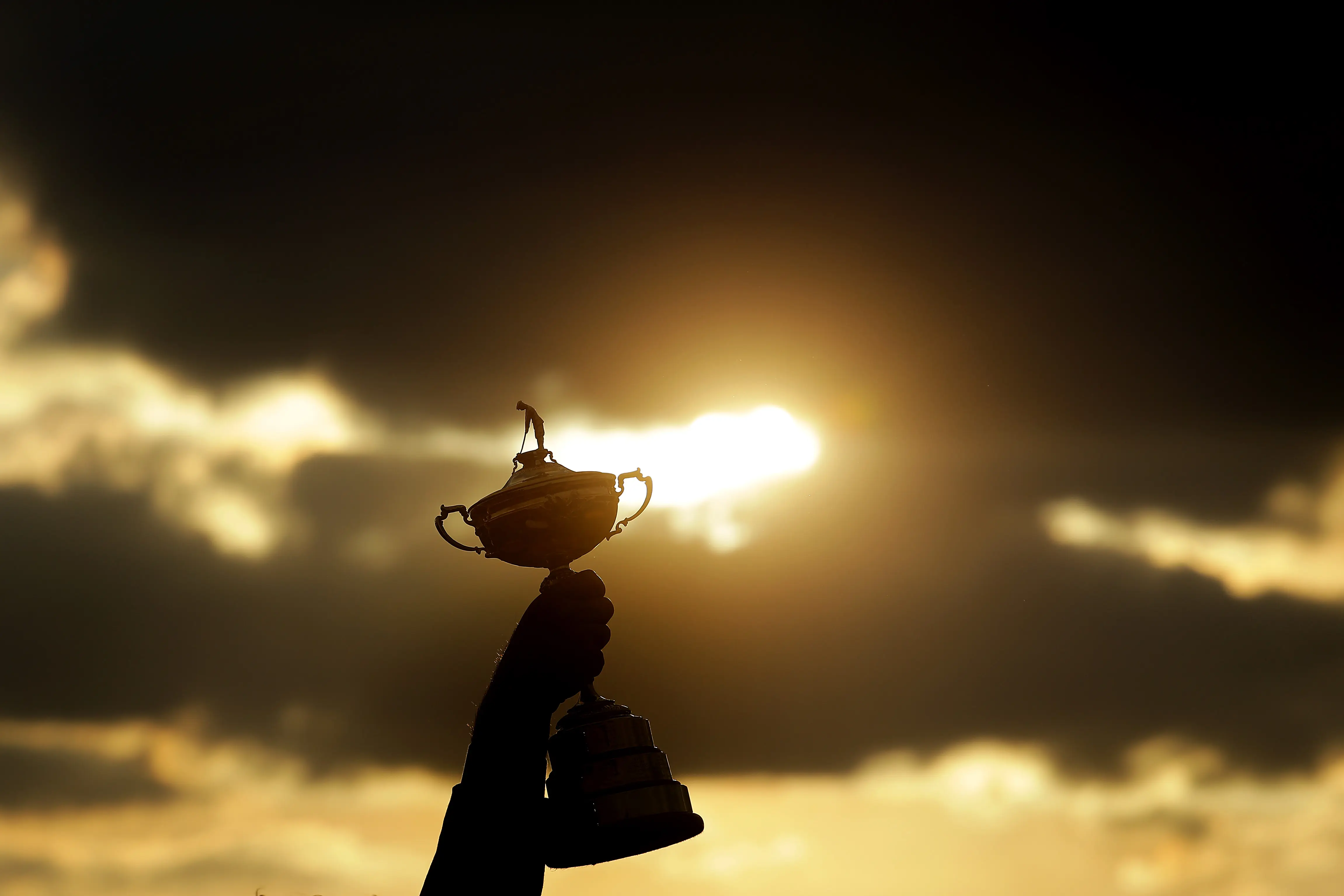 PARIS, FRANCE - SEPTEMBER 30: Thomas Bjorn lifts the Ryder Cup Trophy aloft after Europe secure victory after the singles matches of the 2018 Ryder Cup at Le Golf National on September 30, 2018 in Paris, France. (Photo by Richard Heathcote/Getty Images)