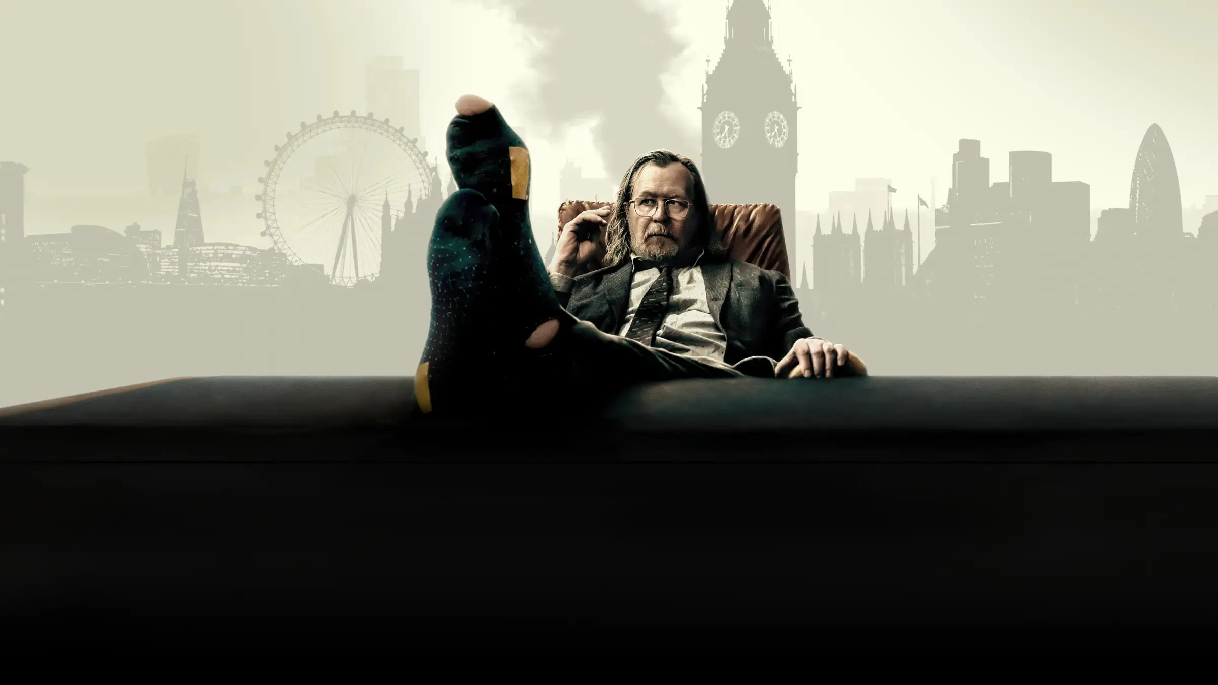 Gary Oldman as Jackson Lamb in Slow Horses season 5 with the London skyline in the background. Image via Apple TV+
