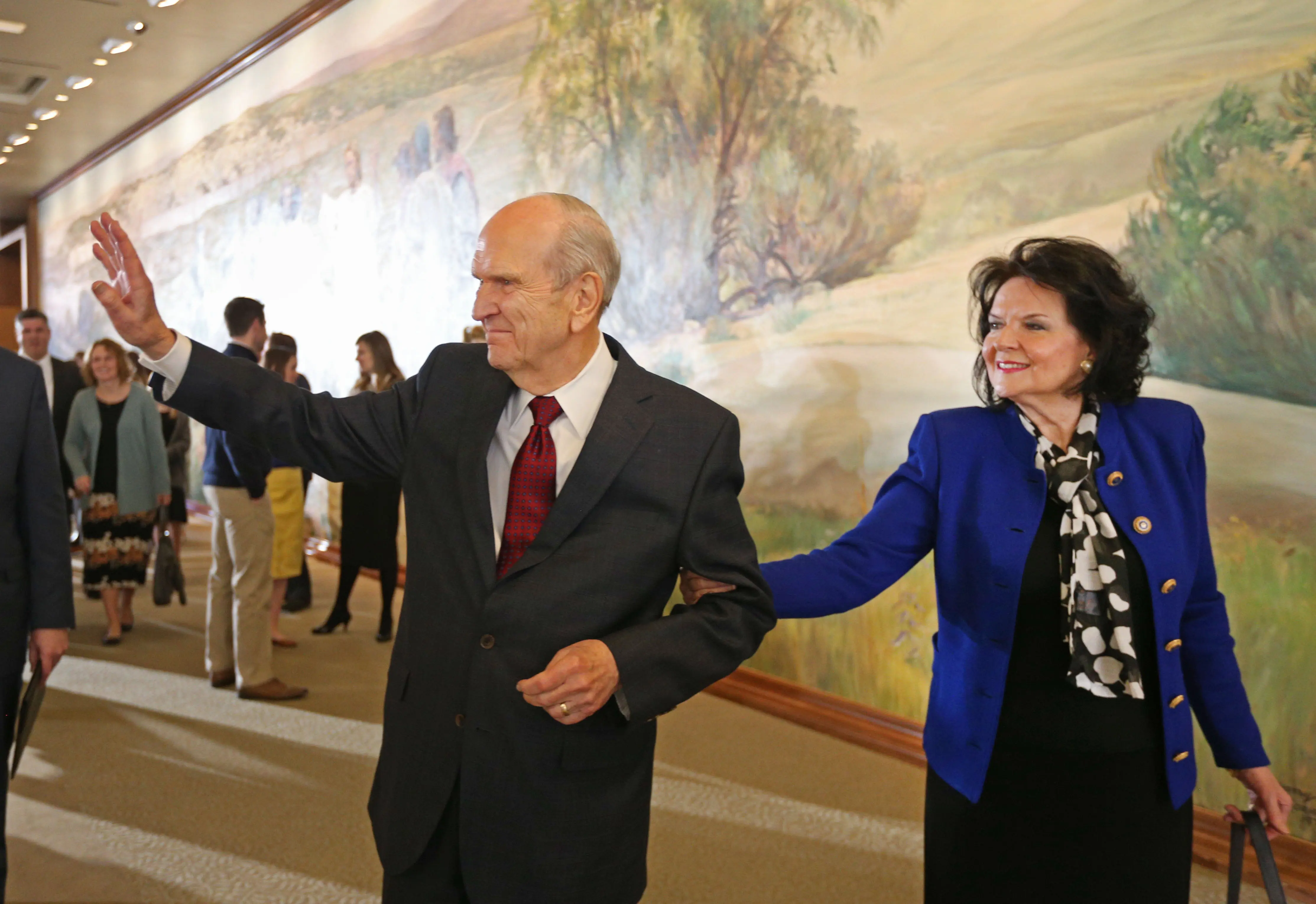 President Russell M. Nelson (L) of the Church of Jesus Christ of Latter -Day Saints and his wife  Wendy L. Watson Nelson, (R) wave as they leave a press conference where they announced Nelson as the 17th president of the Mormon Church on January 16, 2017 in Salt Lake City, Utah. Nelson who is 93, replaced Thomas S. Monson as president after his death a couple weeks ago. (Photo by George Frey/Getty Images)