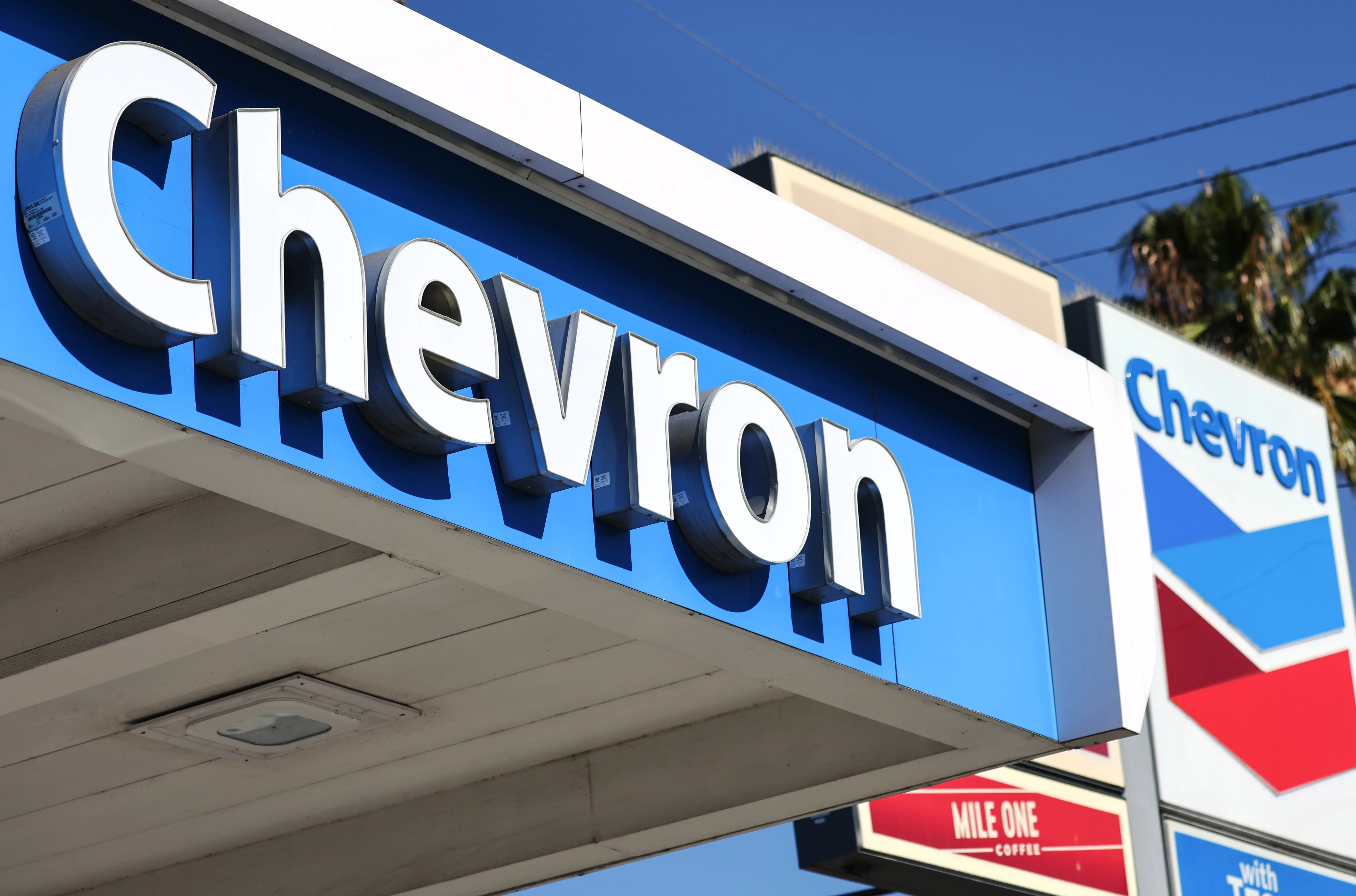 The Chevron logo is displayed at a Chevron gas station on October 28, 2022 in Los Angeles, California. (Photo by Mario Tama/Getty Images)