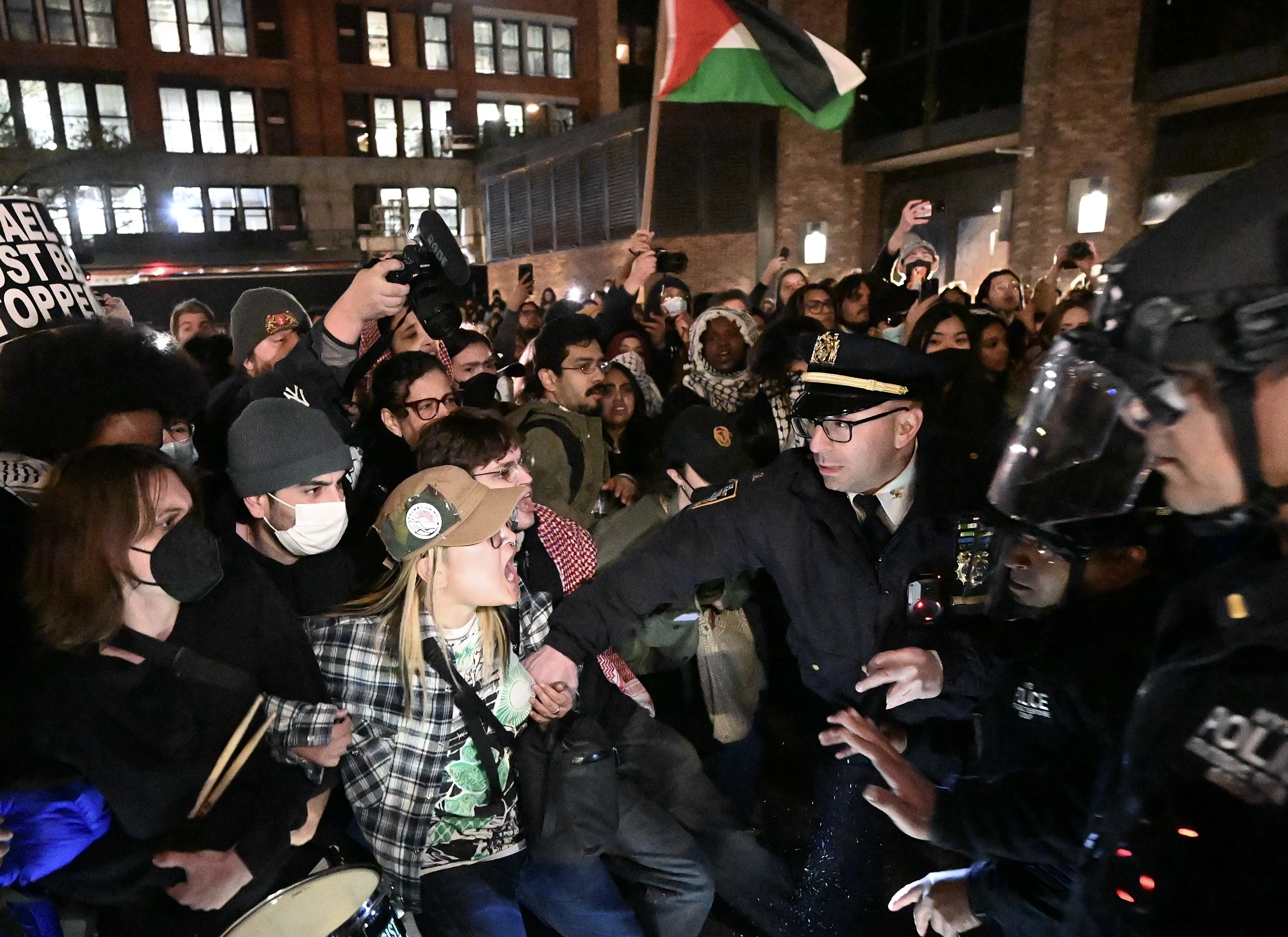 NEW YORK, US - APRIL 22: Police intervene and arrest more than 100 students at New York University (NYU) who continue their demonstration on campus in solidarity with the students at Columbia University and to oppose Israel's attacks on Gaza, in New York, United States on April 22, 2024. Pro-Palestinian protesters have launched a wave of protests on campus condemning Israel's offensive on the Gaza Strip, which has displaced over 75% of the coastal enclave's estimated 2.3 million people, and resulted in over 34,000 deaths, according to Gaza health officials. (Photo by Fatih Aktas/Anadolu via Getty Images)
