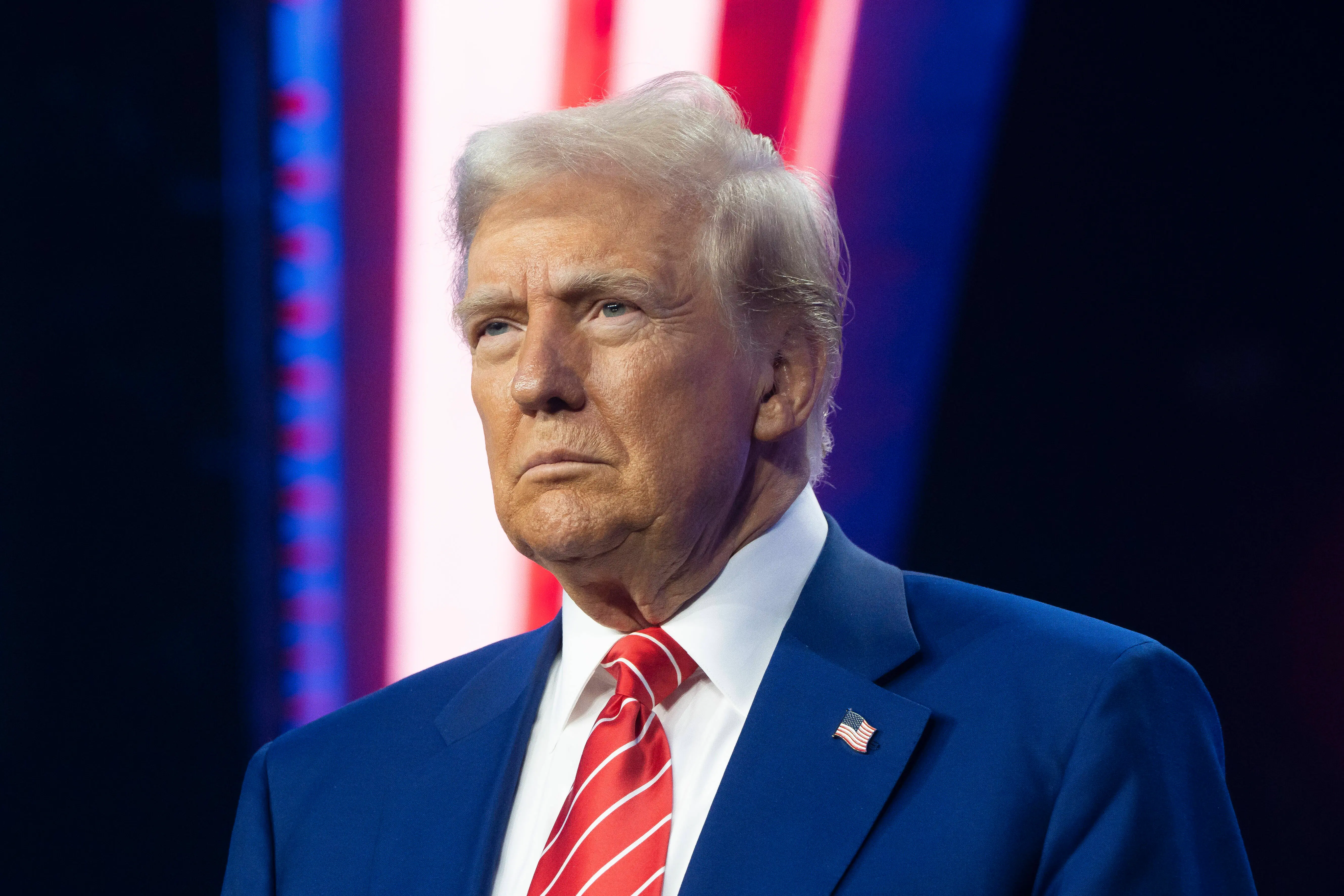 U.S. President-elect Donald Trump looks on during Turning Point USA's AmericaFest at the Phoenix Convention Center on December 22, 2024 in Phoenix, Arizona. The annual four day conference geared toward energizing and connecting conservative youth hosts some of the country's leading conservative politicians and activists. (Photo by Rebecca Noble/Getty Images)
