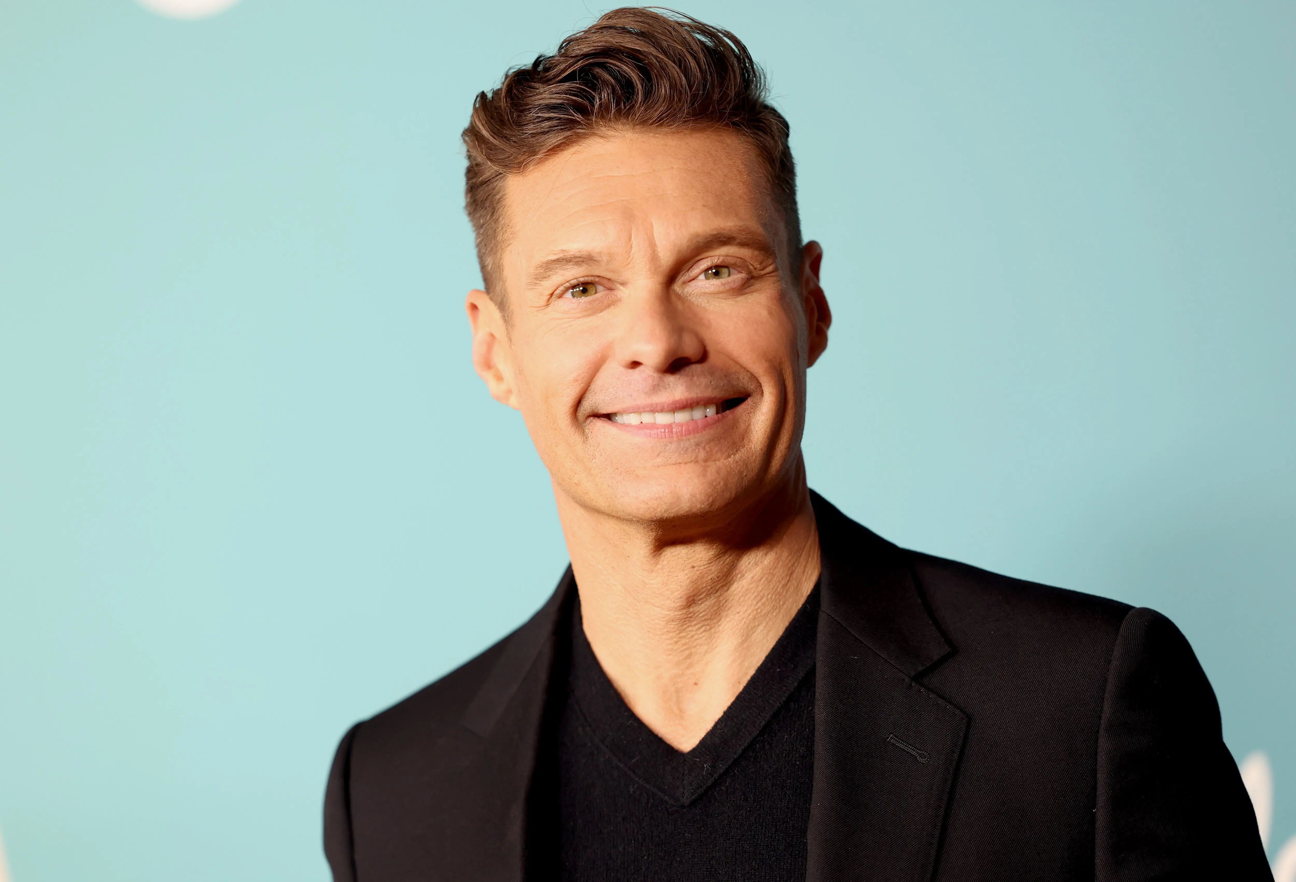 Celebrity Wheel of Fortune host Ryan Seacrest attends the "American Idol" Season 22 Top 10 Event (Image via Getty)