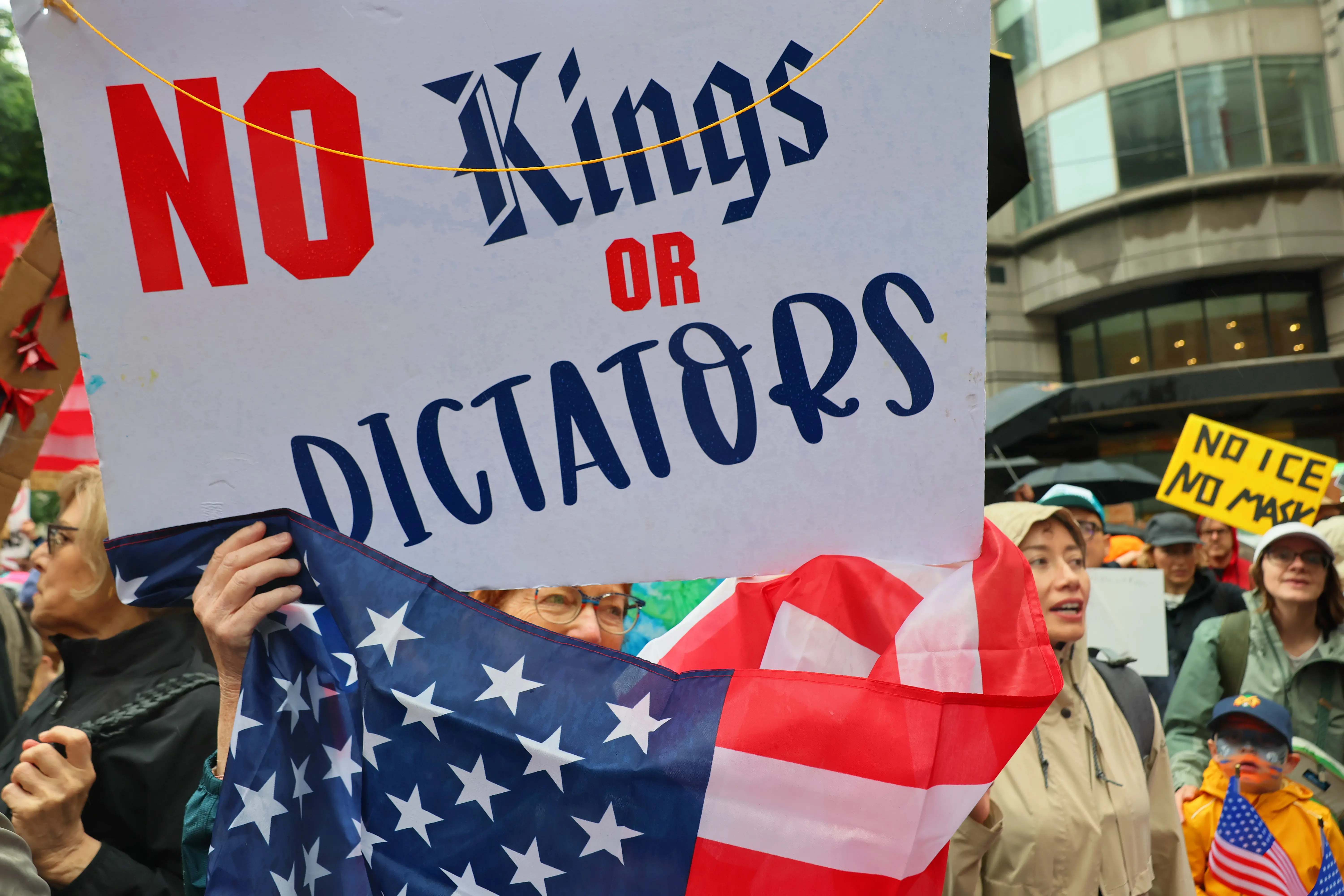 NEW YORK, NEW YORK - JUNE 14: People march in the "No Kings" protest along Fifth Avenue on June 14, 2025 in New York, New York. Hundreds of marches and protests as part of a "national day of peaceful protest" against the Trump administration are happening across the United States today in opposition to his presidency and his policies. The national protest comes as President Donald Trump's military parade celebrating the 250th anniversary of the U.S. Army is taking place in Washington, DC. Today's parade coincides with President Trump's birthday. (Photo by Michael M. Santiago/Getty Images)