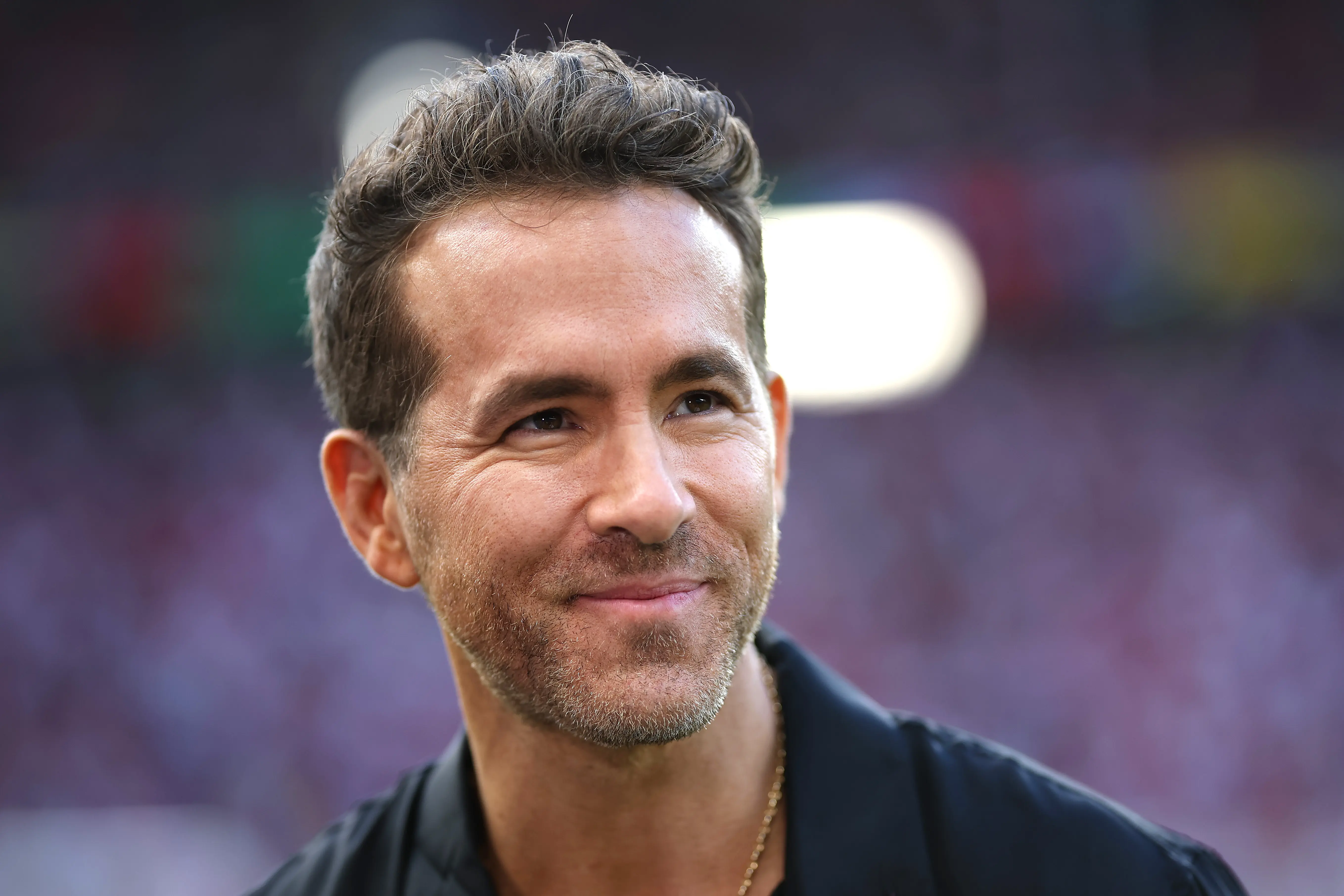  Ryan Reynolds enjoys the pre match atmosphere prior to the UEFA EURO 2024 quarter-final match between Netherlands and Türkiye at Olympiastadion on July 06, 2024 in Berlin, Germany. (Photo by Boris Streubel - UEFA/UEFA via Getty Images)