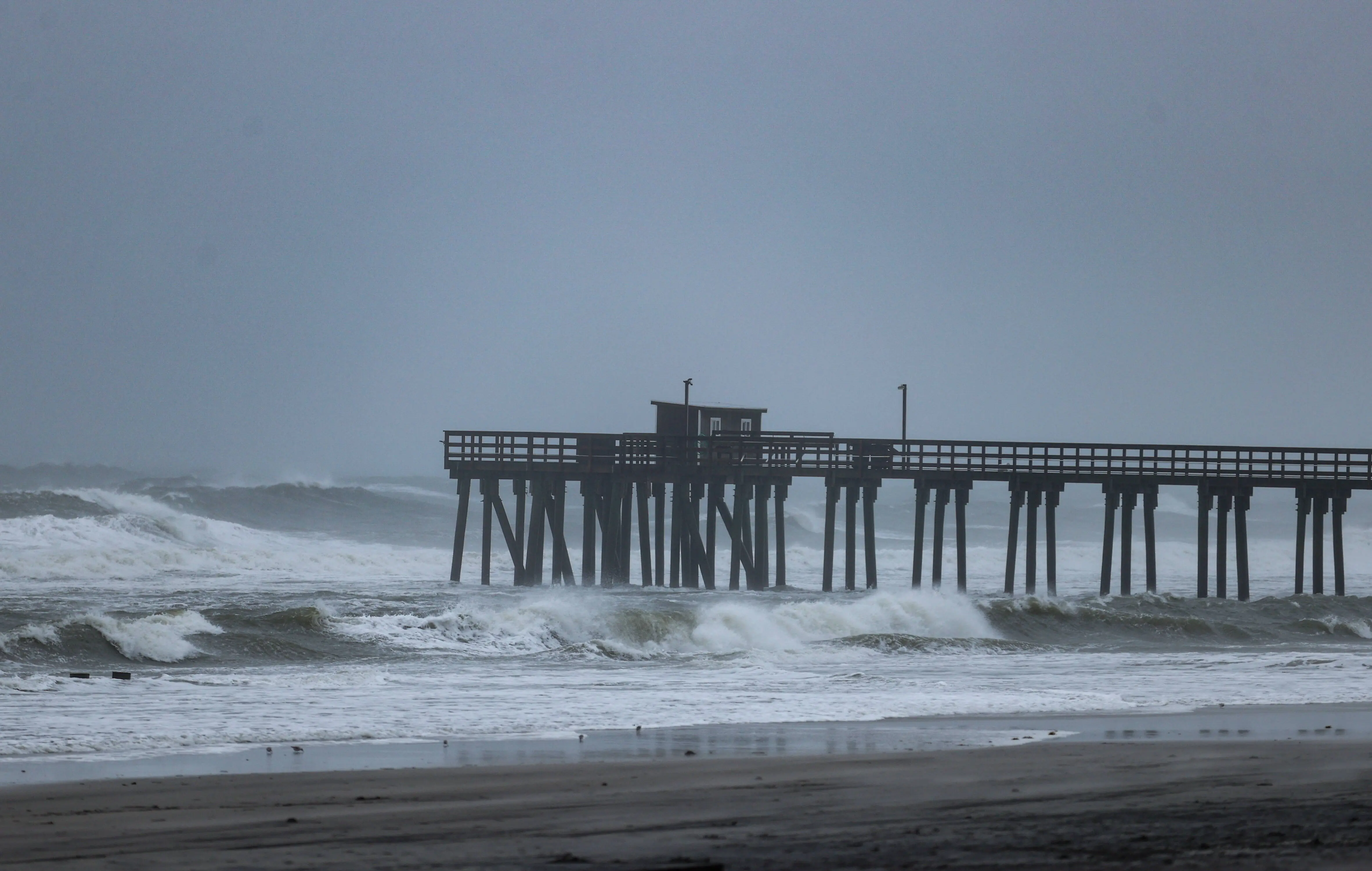 A powerful nor'easter brings coastal flooding to the Jersey Shore on Sunday afternoon, with high tide sending water over docks and into streets in Avalon, New Jersey, United States on October 12, 2025. Strong winds and heavy surf caused dangerous conditions along the coast as officials urged residents to avoid flooded areas. (Photo by Lokman Vural Elibol/Anadolu via Getty Images)