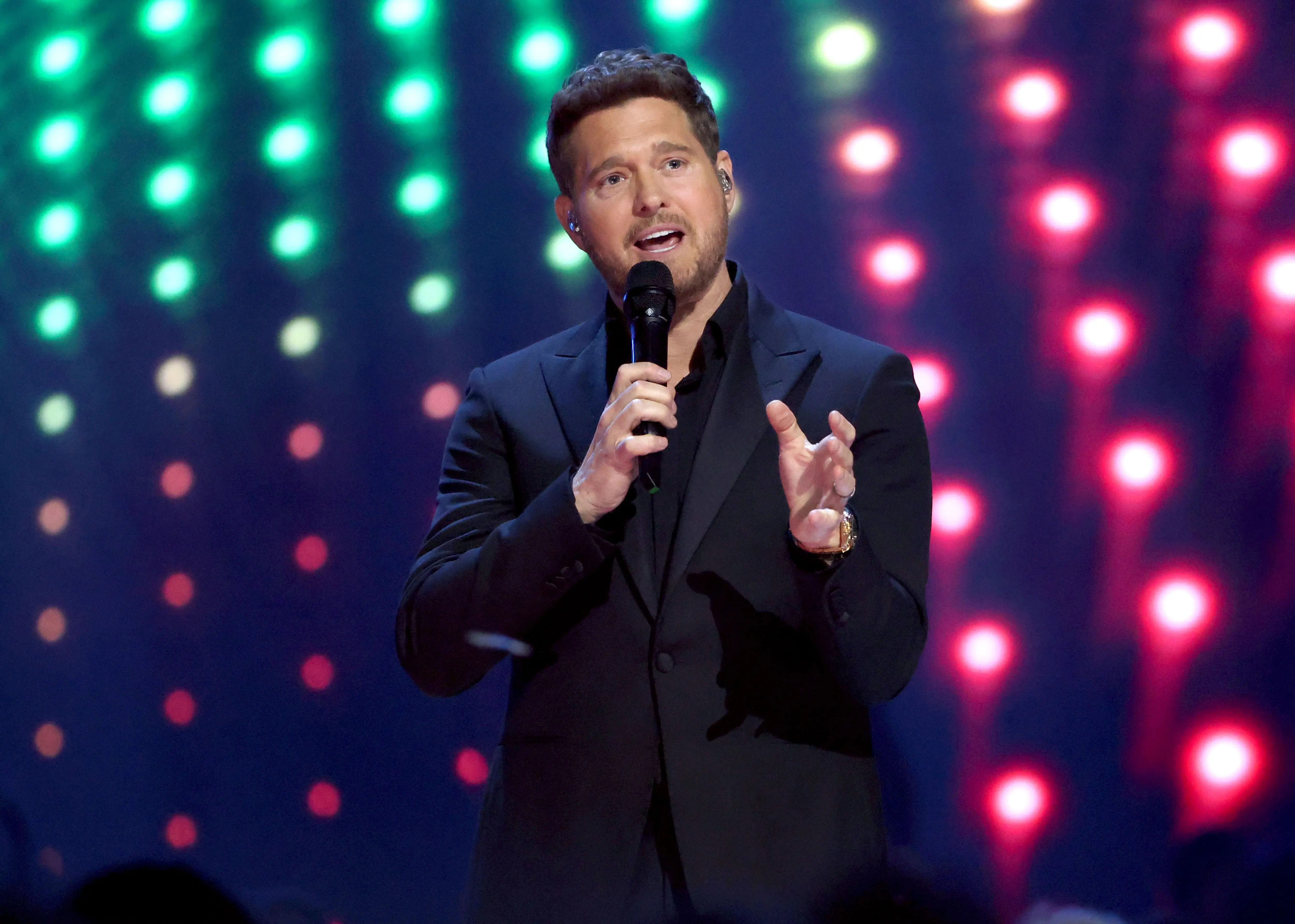 The Voice coash Michael Bublé speaks onstage during the 2025 JUNO Awards (Image via Getty)
