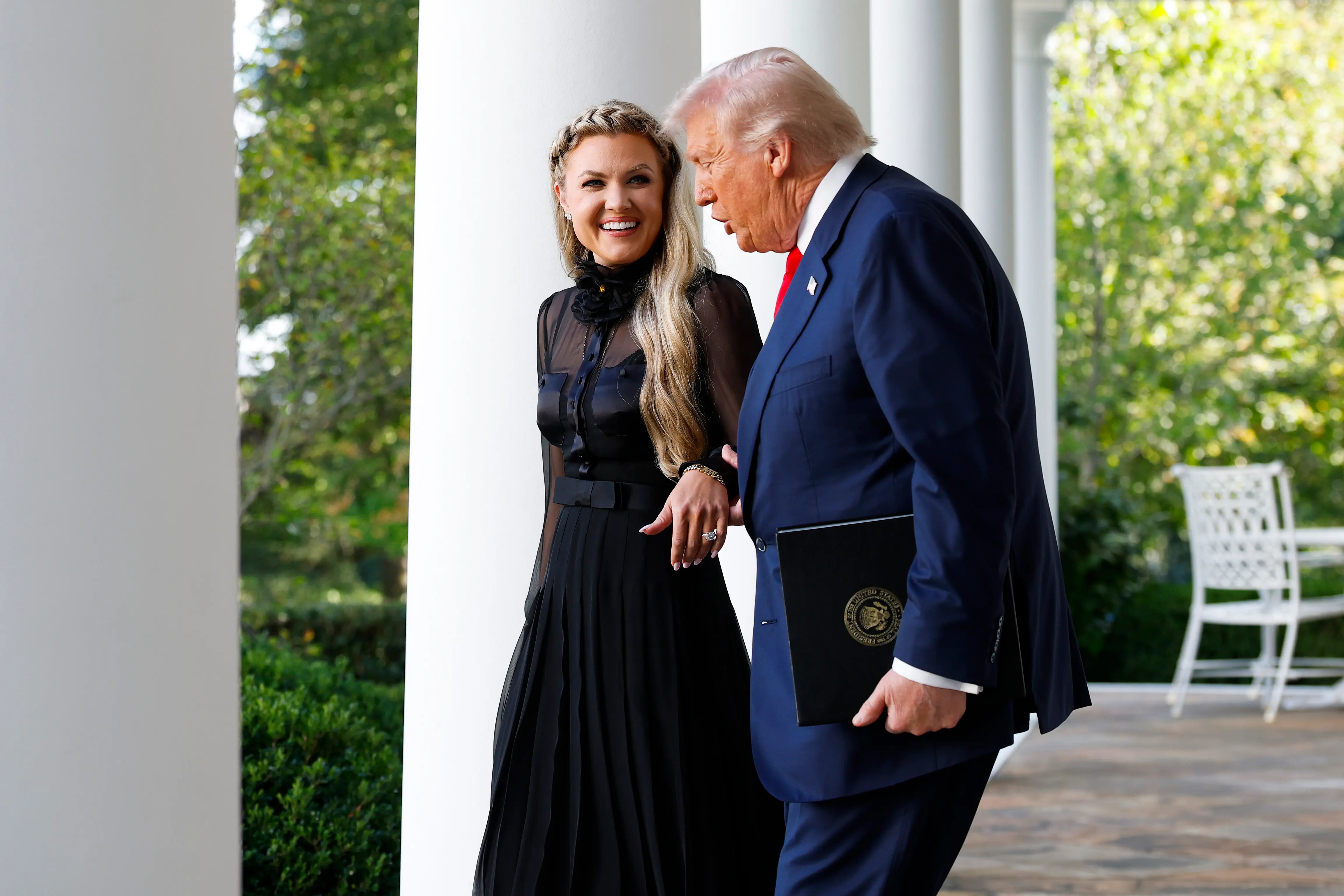 WASHINGTON, DC - OCTOBER 14: Erika Kirk (L), wife of late conservative activist Charlie Kirk, arrives with U.S. President Donald Trump as he posthumously awards the Presidential Medal of Freedom to Charlie Kirk during a ceremony in the Rose Garden of the White House on October 14, 2025 in Washington, DC. Today marks the National Day of Remembrance for Charlie Kirk who was shot and killed on September 10th at Utah Valley University. (Photo by Kevin Dietsch/Getty Images)