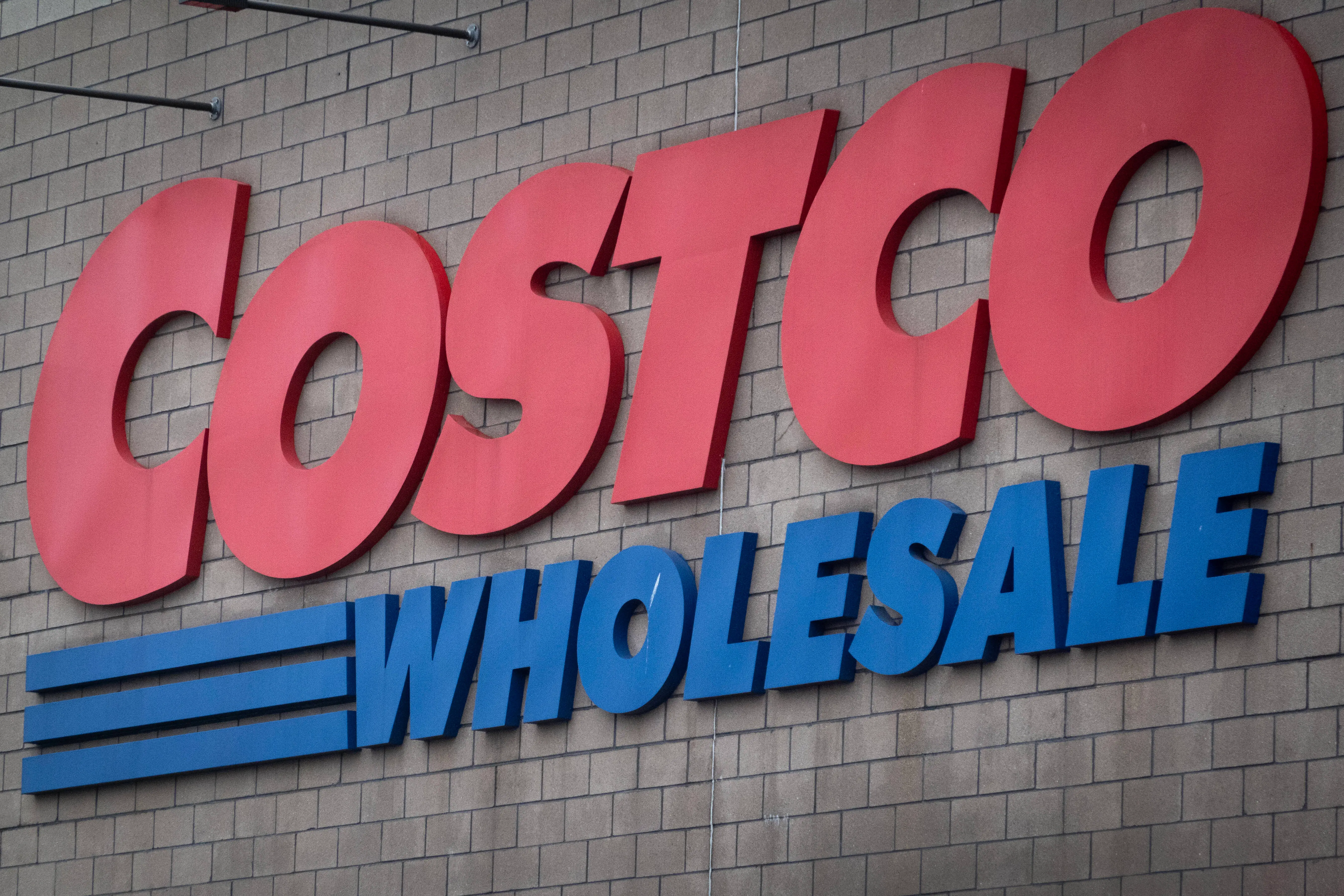 CHICAGO, ILLINOIS - JANUARY 31: A sign hangs outside of Costco Wholesale store on January 31, 2025 in Chicago, Illinois. According to a company memo, the company plans to increase pay for most of its hourly workers to more than $30-per-hour. This news comes as Costco Teamsters union members have voted in favor of a nationwide strike if a new contract deal isn't reached ahead of a Jan. 31 deadline. (Photo by Scott Olson/Getty Images)