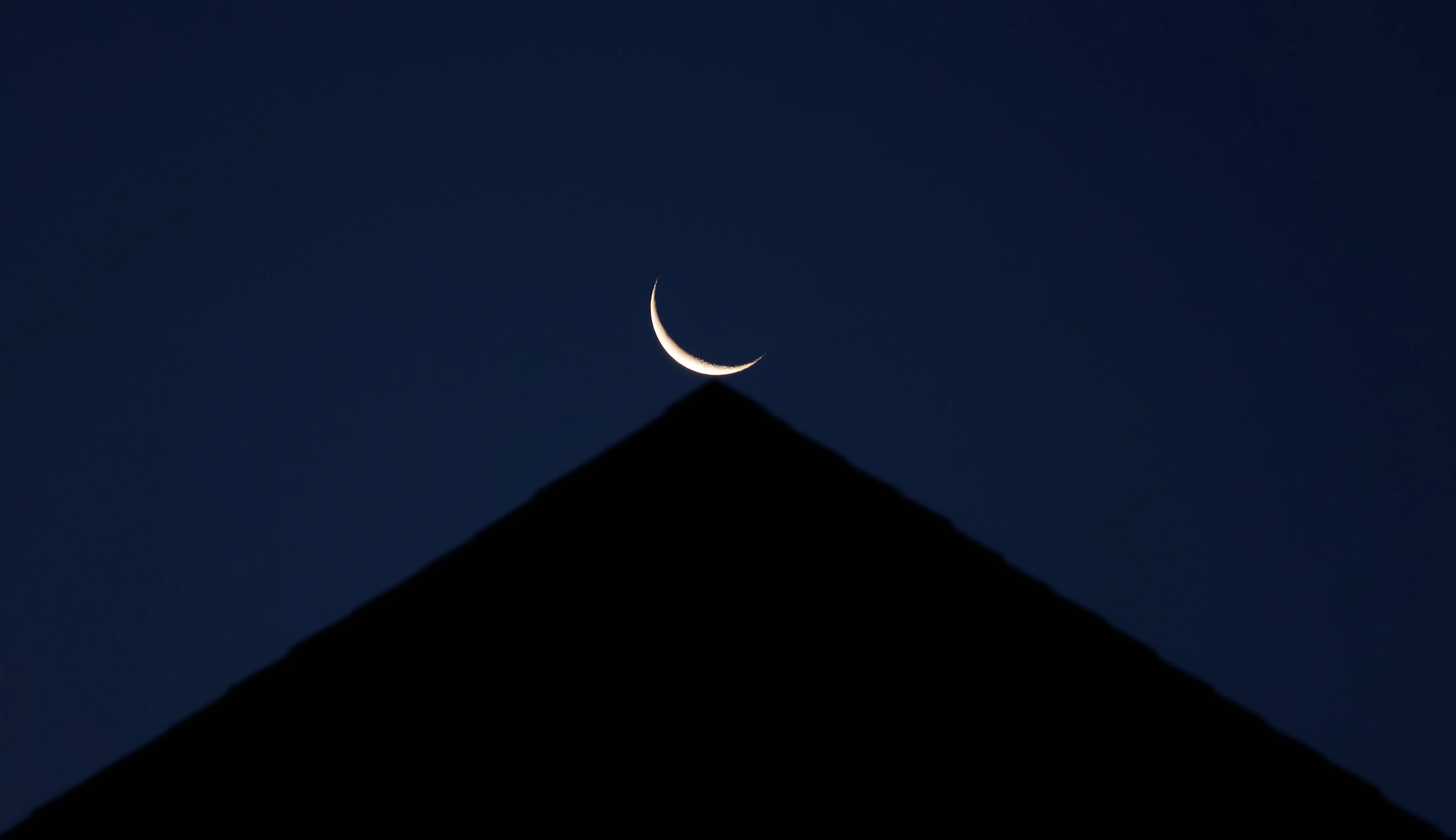 HOBOKEN, NJ - AUGUST 1: A 9 percent waning crescent moon rises before sunrise on August 1, 2024, in Hoboken, New Jersey.  (Photo by Gary Hershorn/Getty Images)